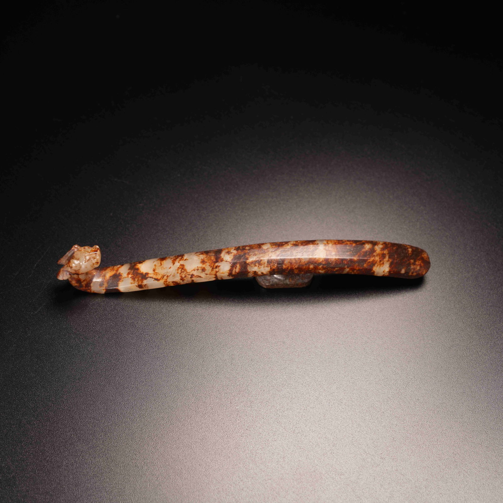 A DRAGON-HEAD BELT HOOK IN ARCHAIC JADE: Dragon-Head Belt Hook in Archaic Jade