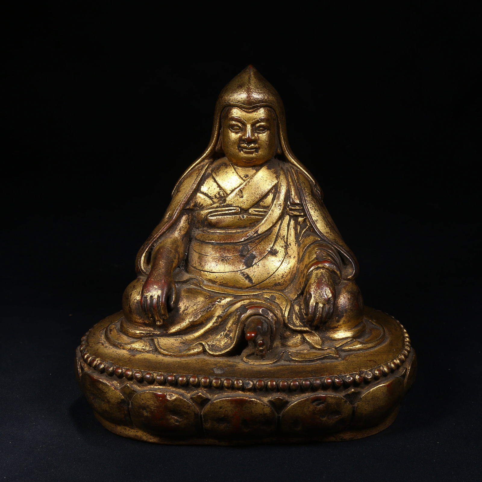 A GILT BRONZE LAMA (GURU) STATUE: Gilt Bronze Lama (Guru) Statue