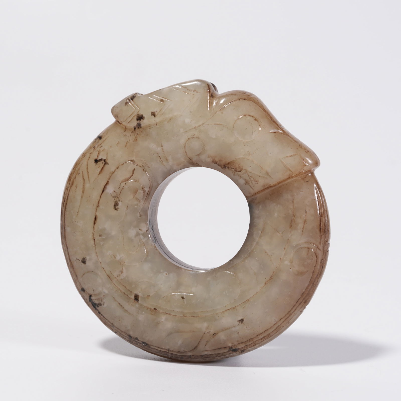 A HETIAN JADE DRAGON PENDANT (1 of 9)