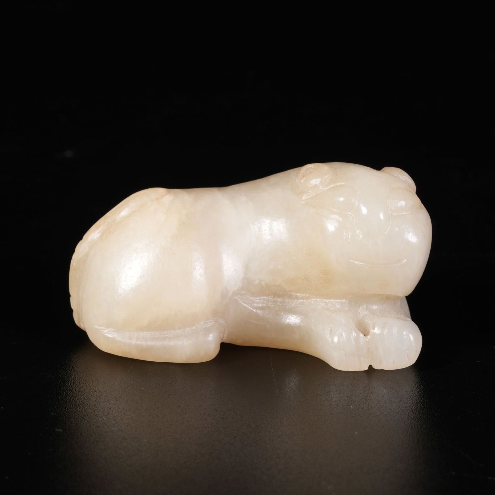 A HETIAN JADE TIGER ORNAMENT: Hetian Jade Tiger Ornament