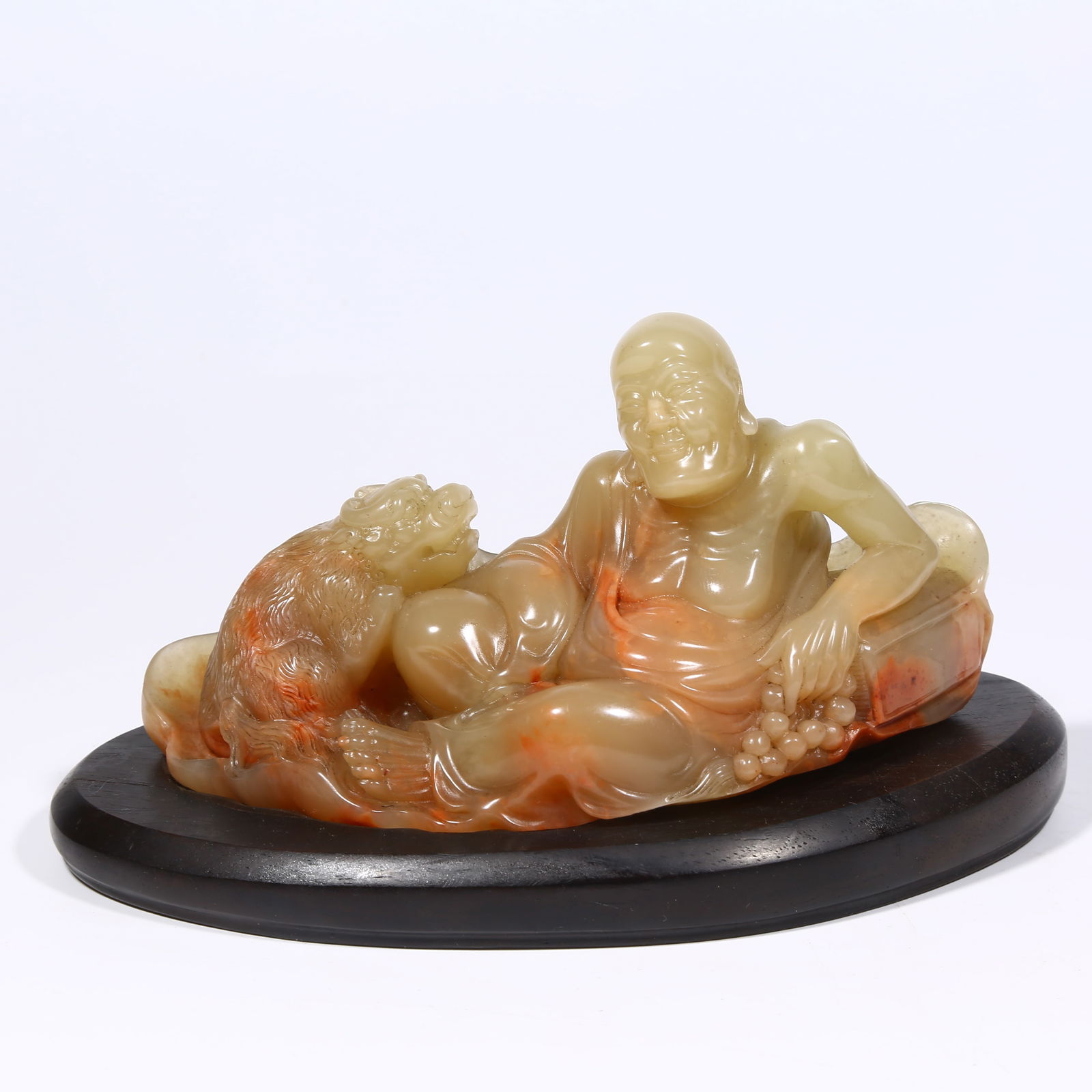 A SHOUSHAN STONE ARHAT FIGURINE: Shoushan stone Arhat figurine