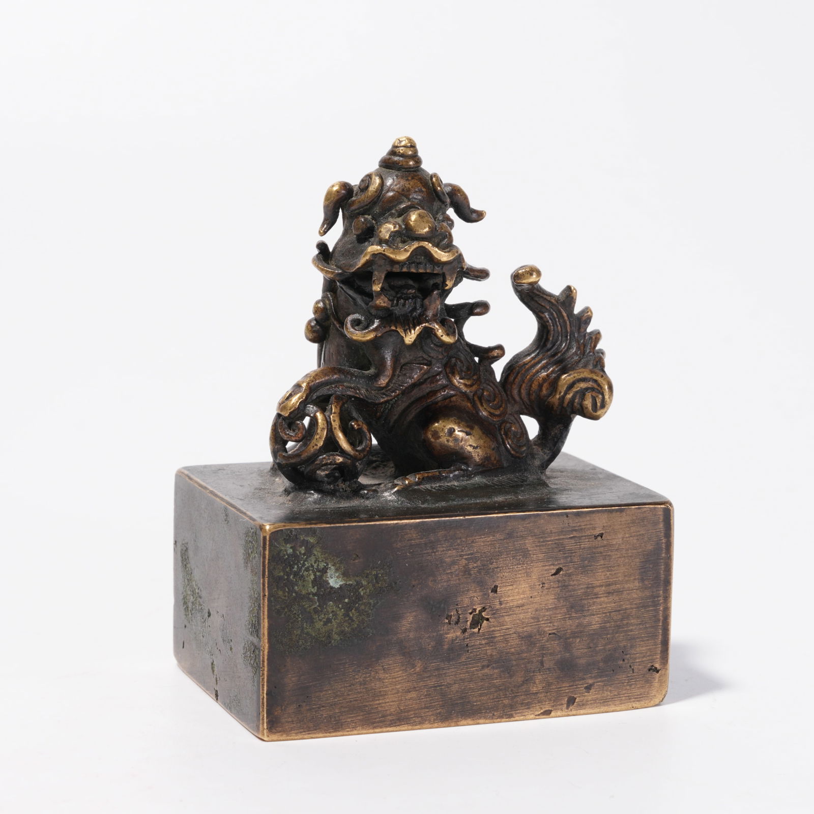 A BRONZE PAPERWEIGHT WITH LION FINIAL ROLLING BALL: Bronze Paperweight with Lion Finial Rolling Ball