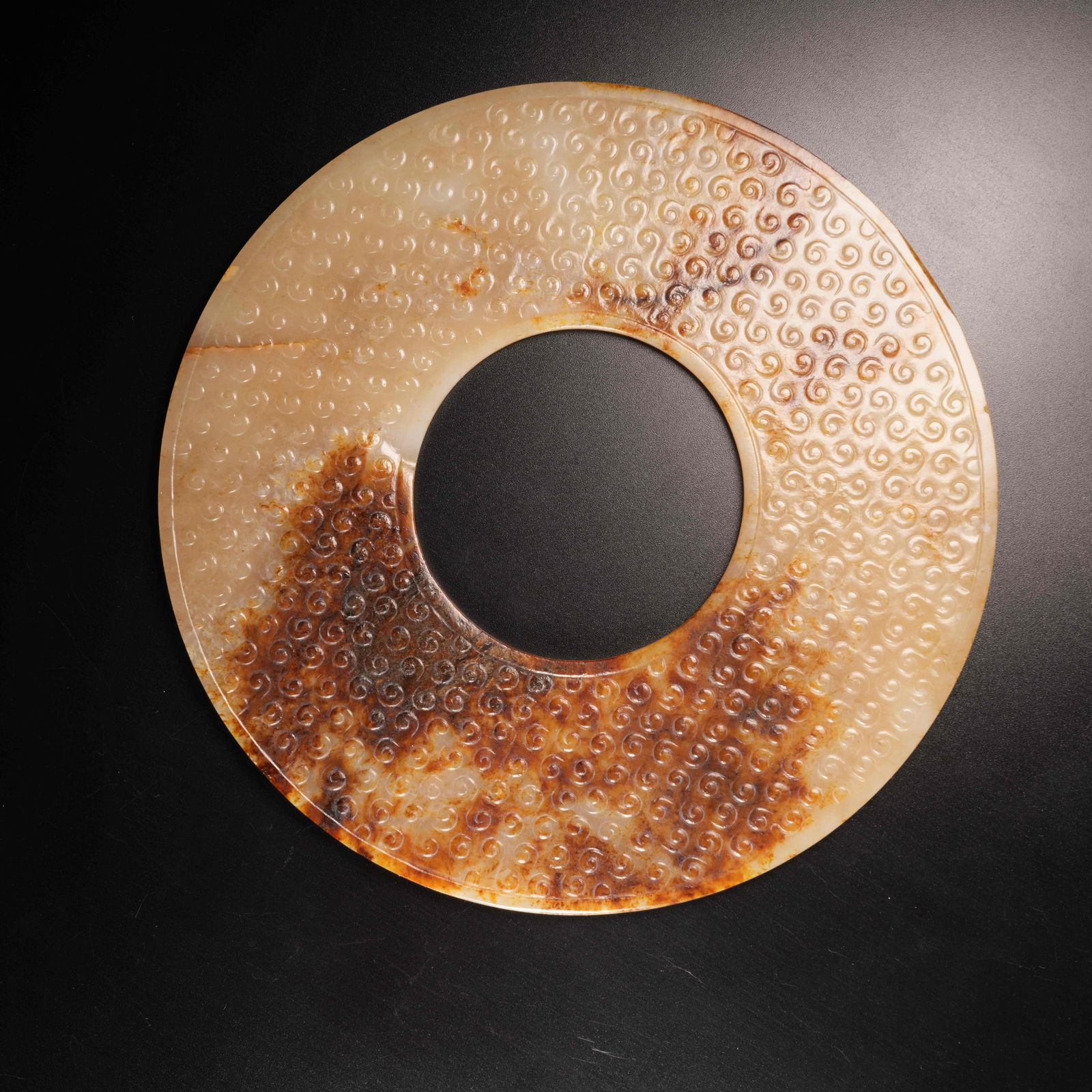 A HOOKED-CLOUD PATTERN BI DISK IN ARCHAIC JADE: Hooked-Cloud Pattern Bi Disk in Archaic Jade
