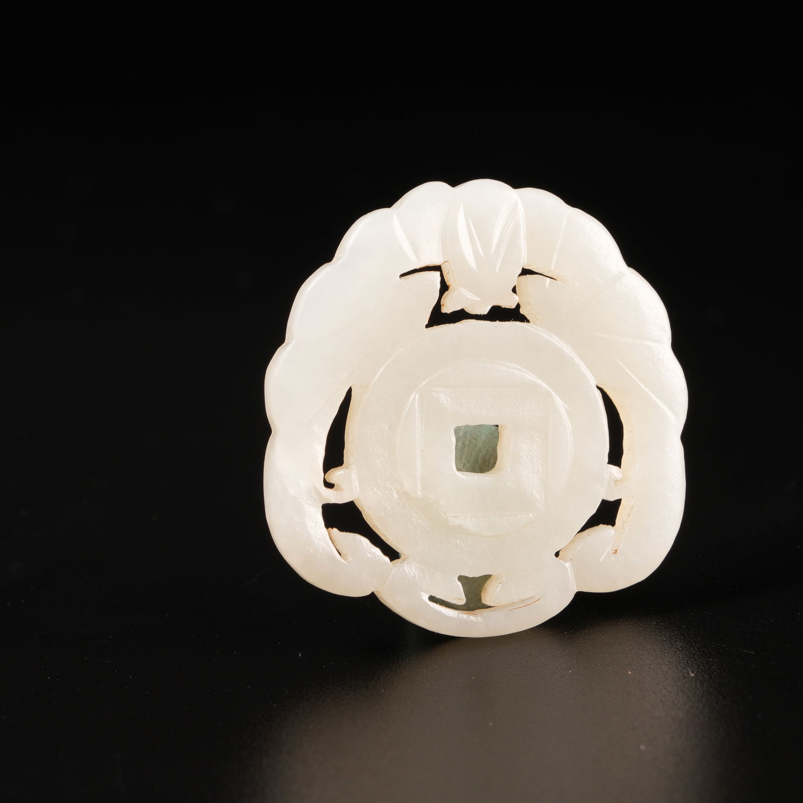 A HETIAN JADE WEALTH-AND-FORTUNE PENDANT (1 of 8)