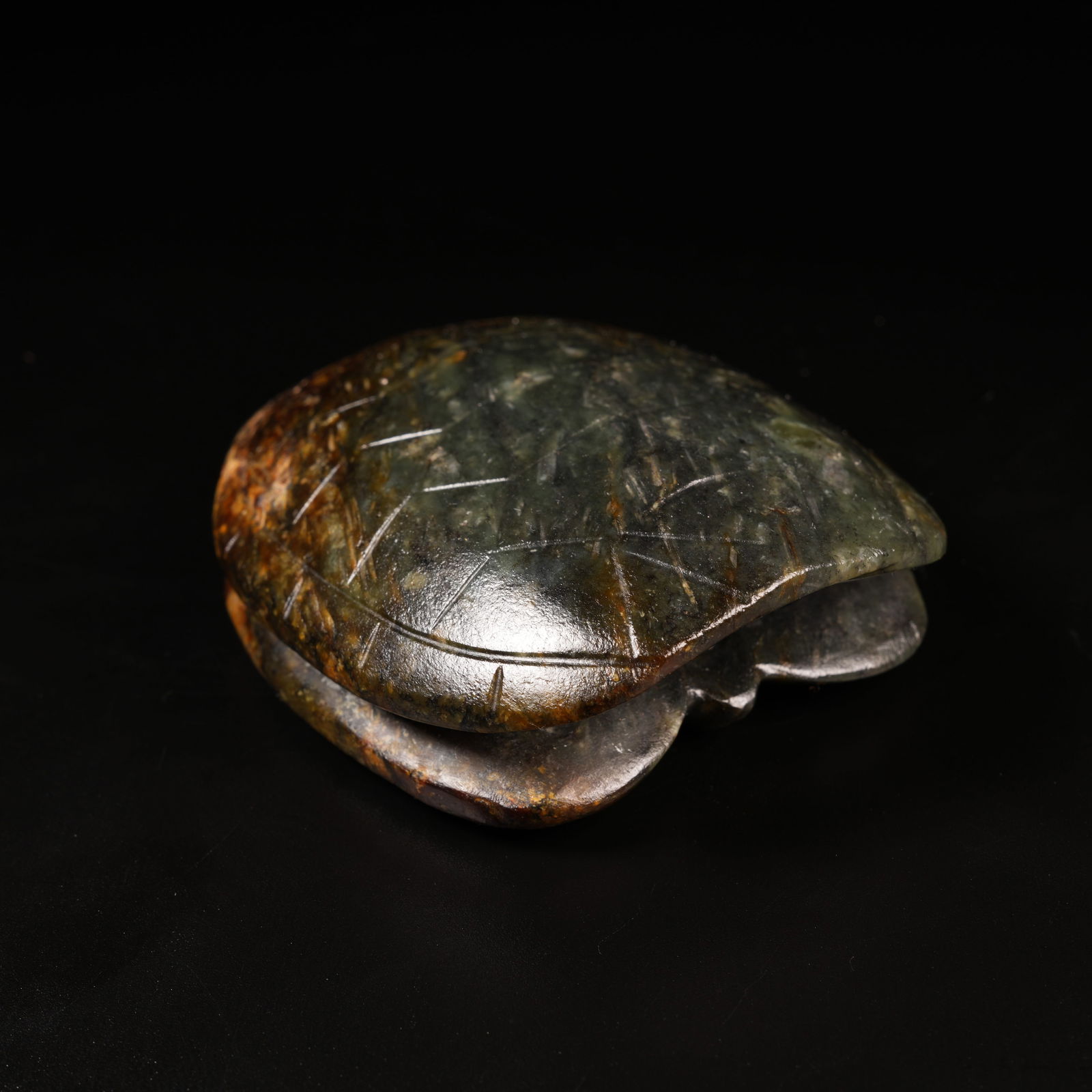 A ARCHAIC JADE TORTOISE-SHELL PENDANT: Archaic Jade Tortoise-Shell Pendant