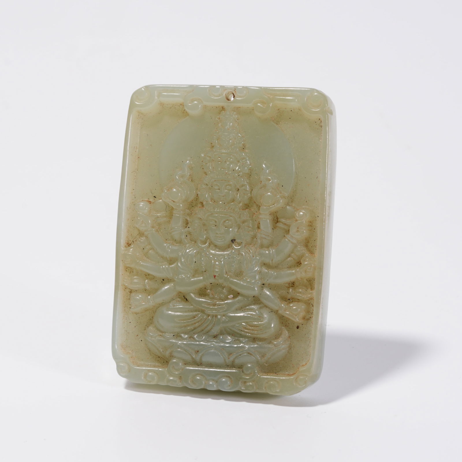 A HETIAN JADE ELEVEN-FACED BUDDHA PLAQUE: Hetian Jade Eleven-Faced Buddha Plaque