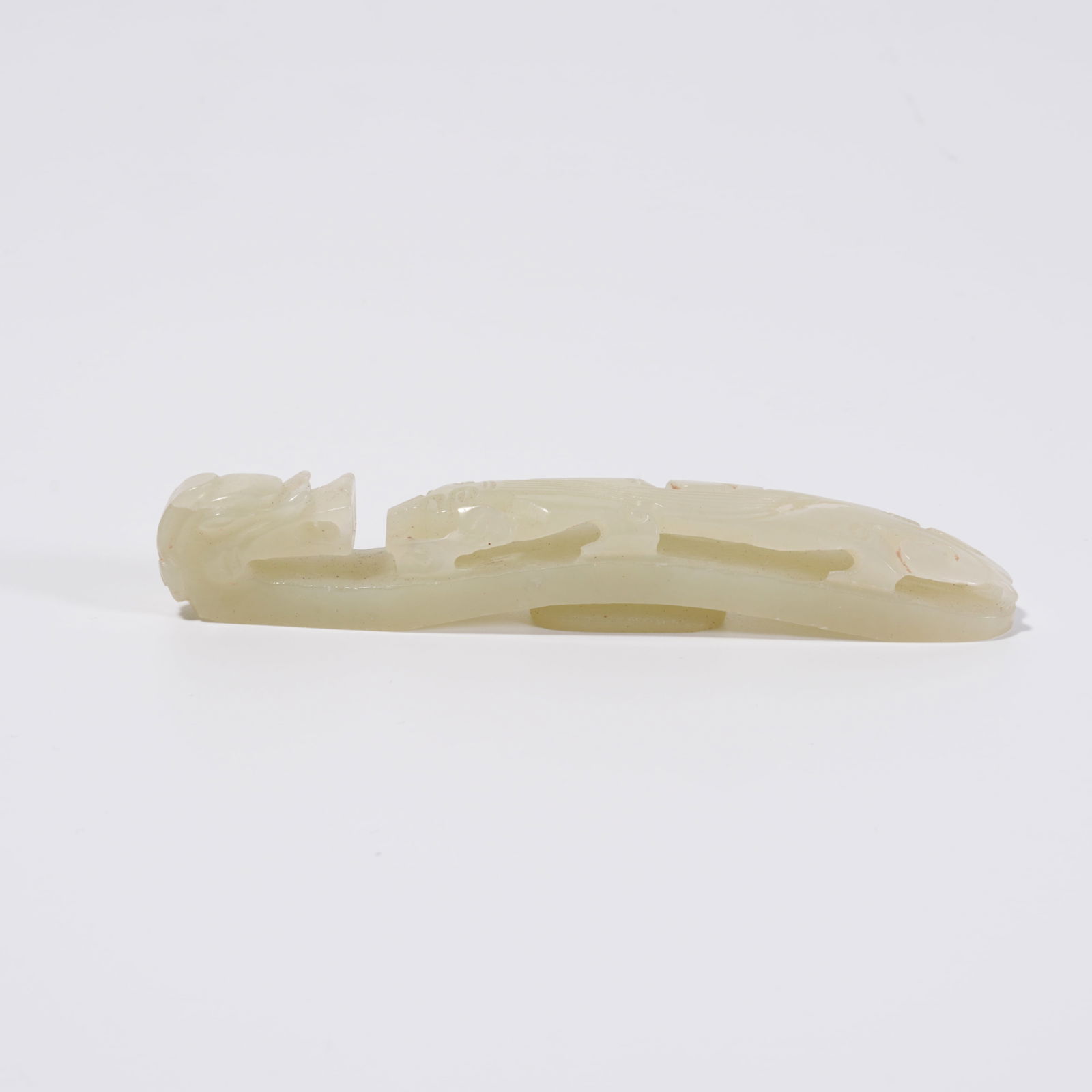 A HETIAN JADE DRAGON-SHAPED ORNAMENT WITH HOOK: Hetian Jade Dragon-Shaped Ornament with Hook