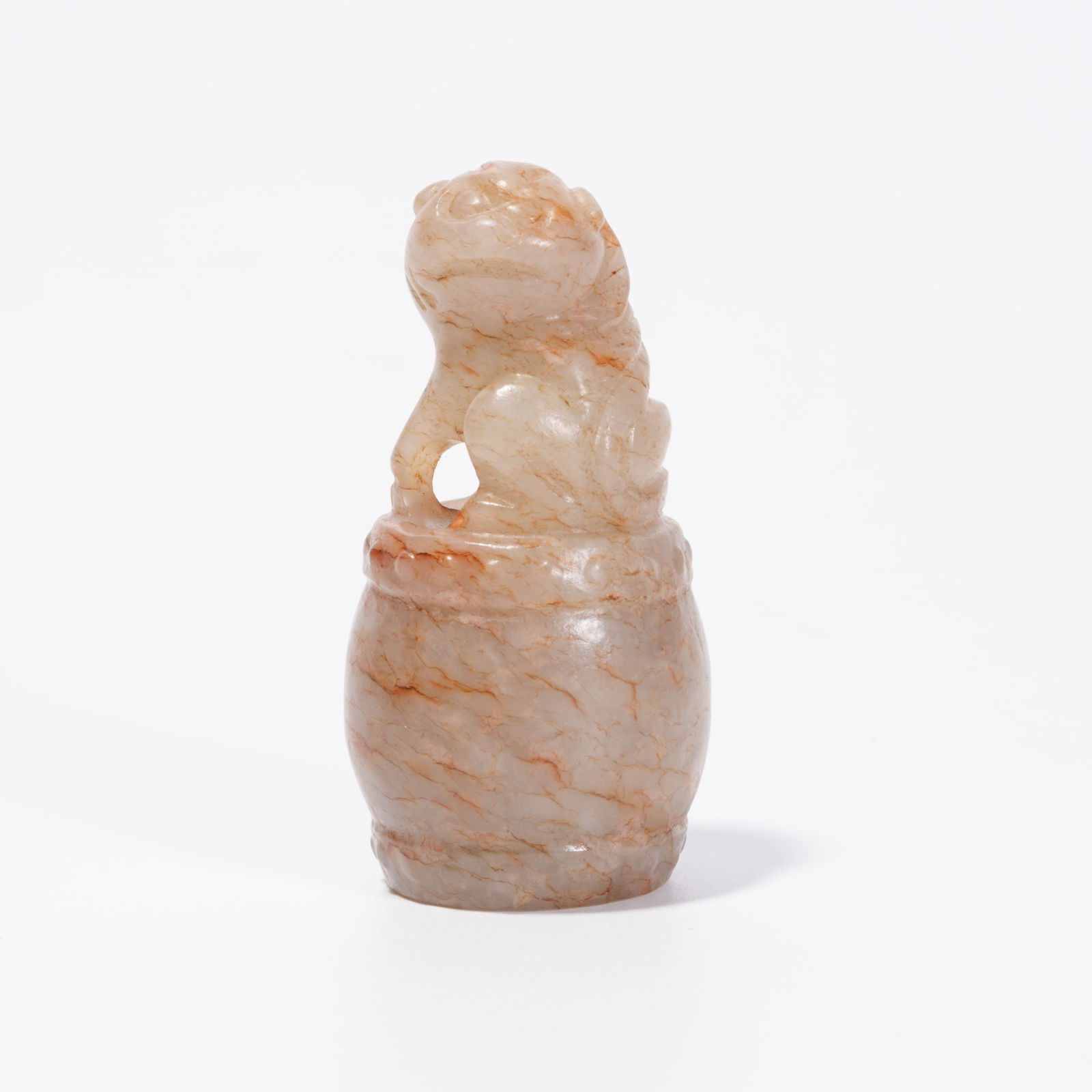 A HETIAN JADE LION-HEAD ORNAMENT: Hetian Jade Lion-Head Ornament