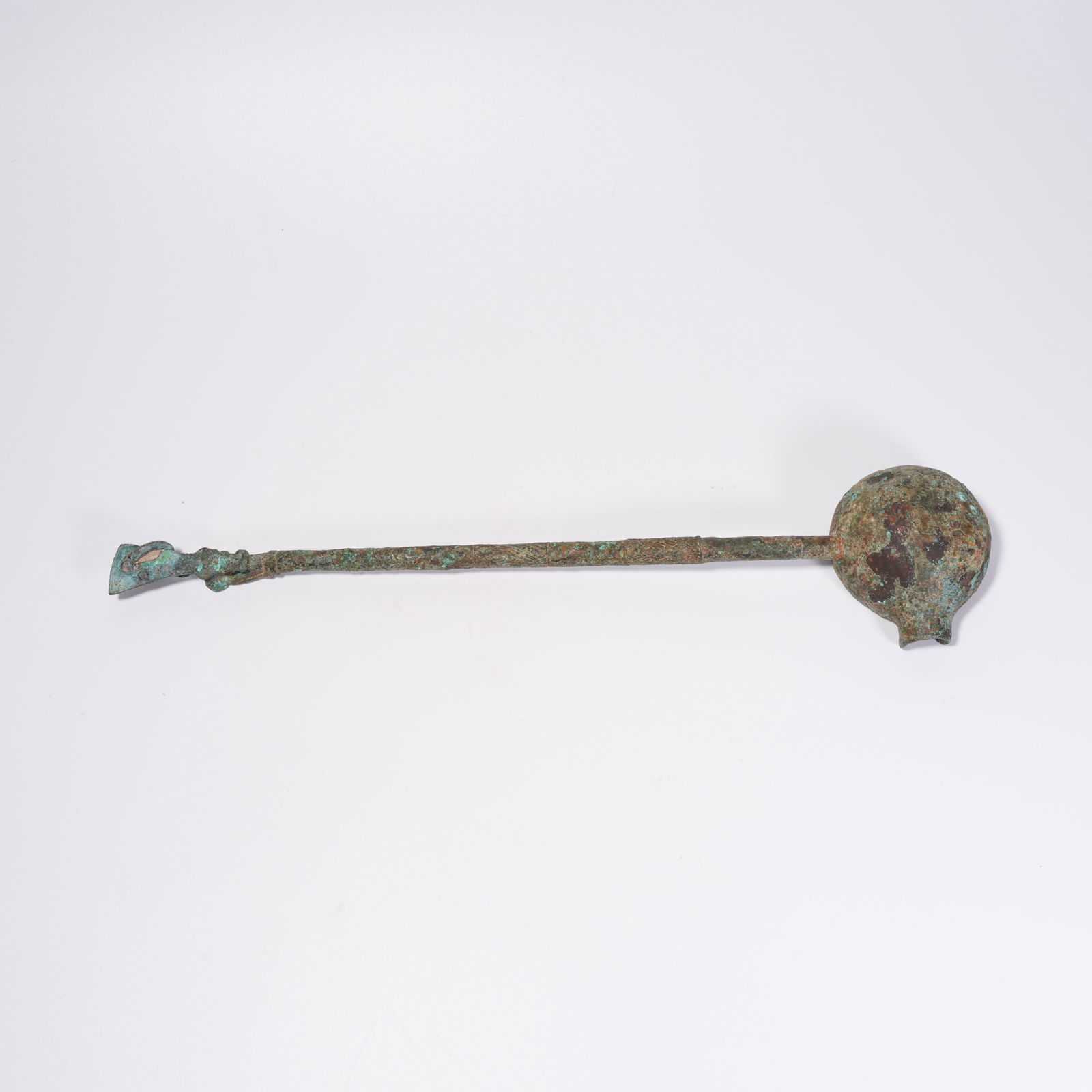A BRONZE SPOON - 5