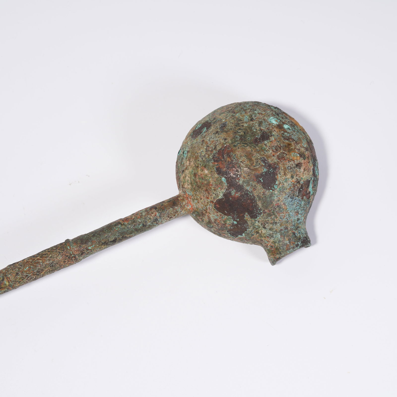 A BRONZE SPOON - 6