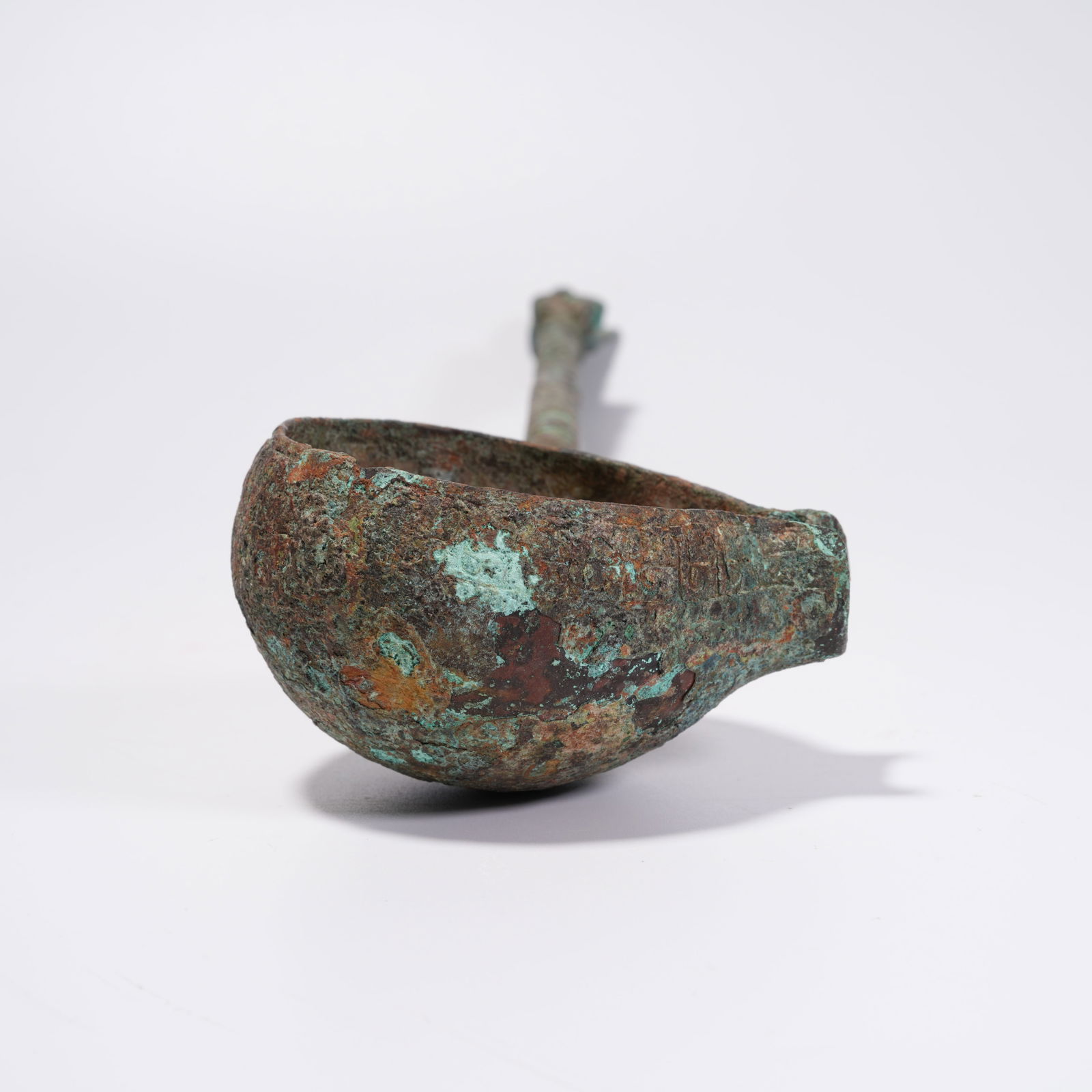 A BRONZE SPOON - 9