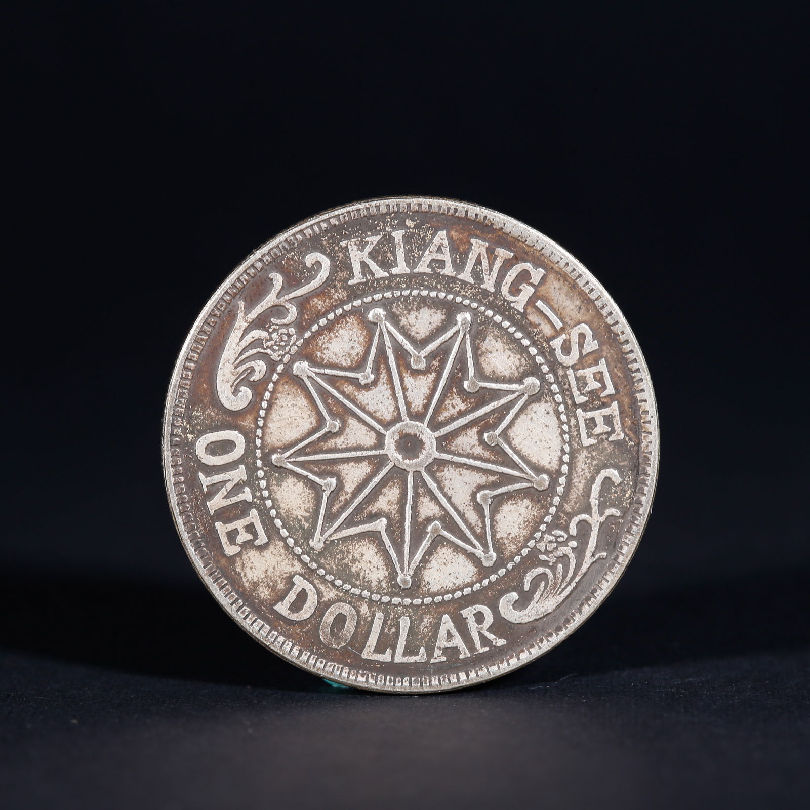 A SILVER DOLLAR COIN - 2