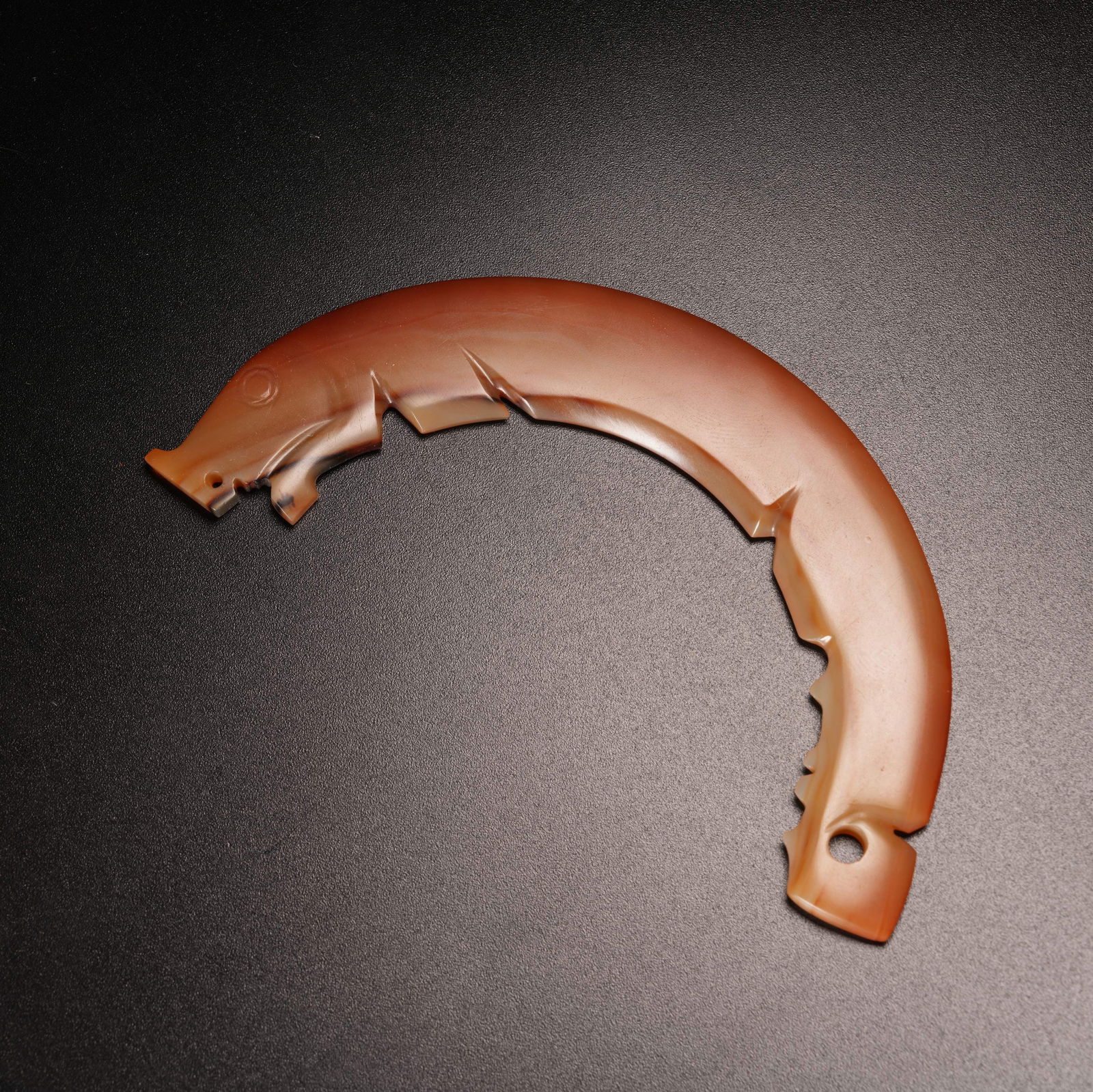 A FISH-SHAPED AGATE PENDANT: Fish-Shaped Agate Pendant