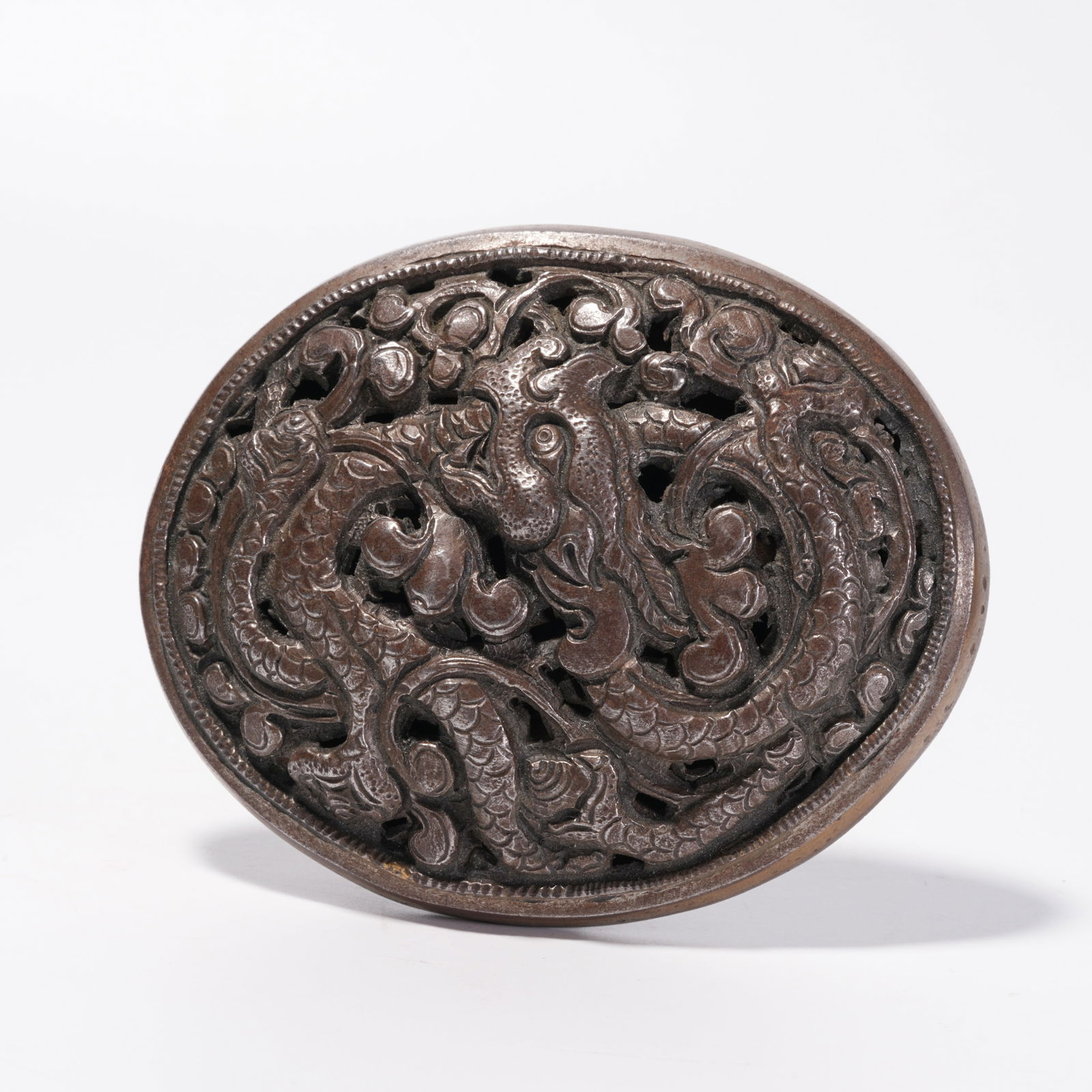 A BRONZE DRAGON-PATTERNED BELT PLATE: Bronze Dragon-Patterned Belt Plate