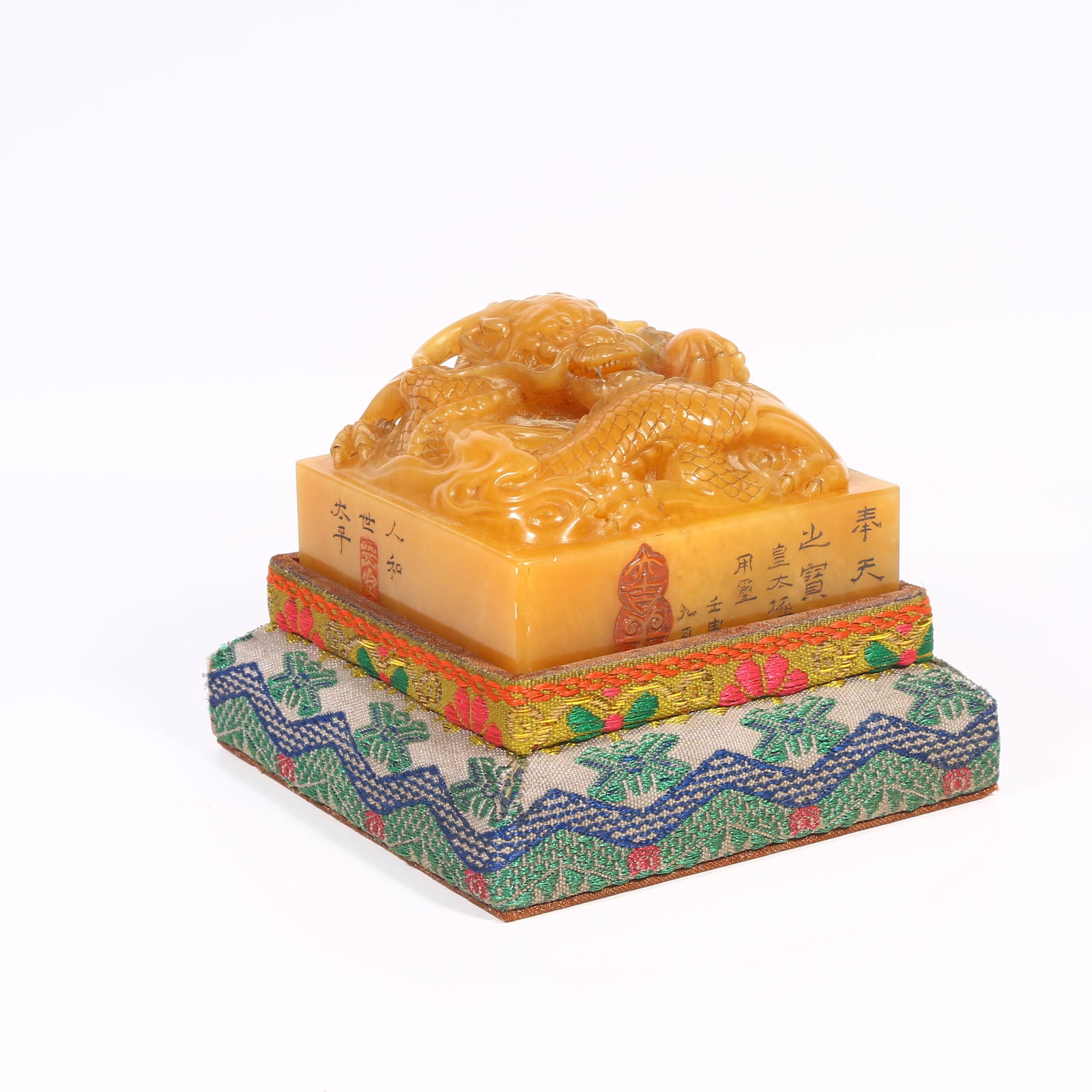 A SHOUSHAN TIANHUANG STONE SEAL WITH DRAGON-SHAPED KNOB: Shoushan Tianhuang stone seal with dragon-shaped knob
