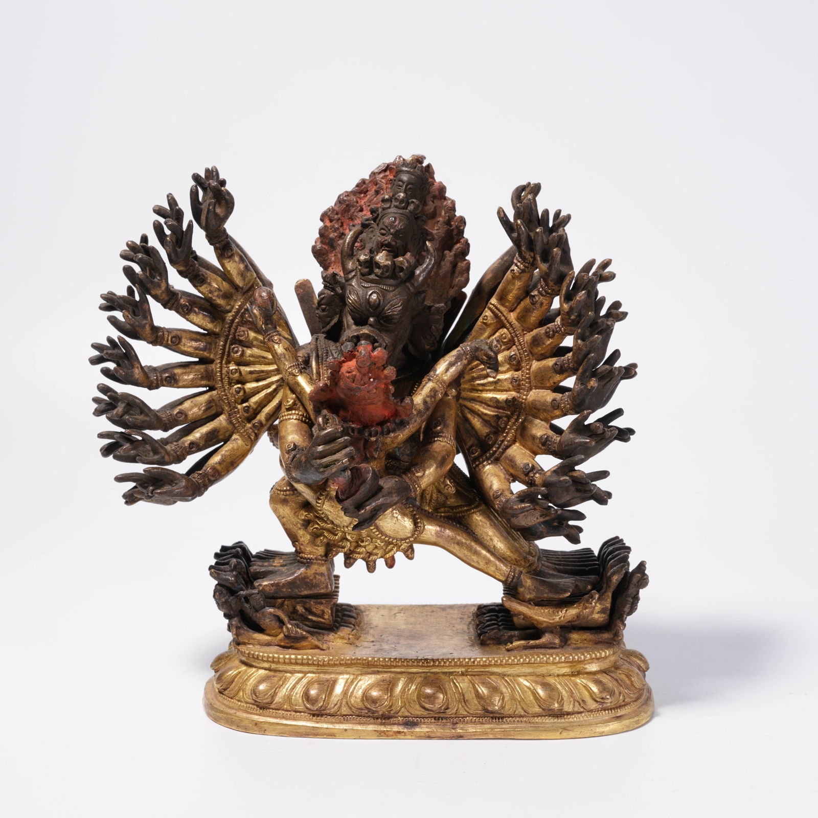 A GILDED BRONZE MAH?K?LA STATUE (1 of 10)