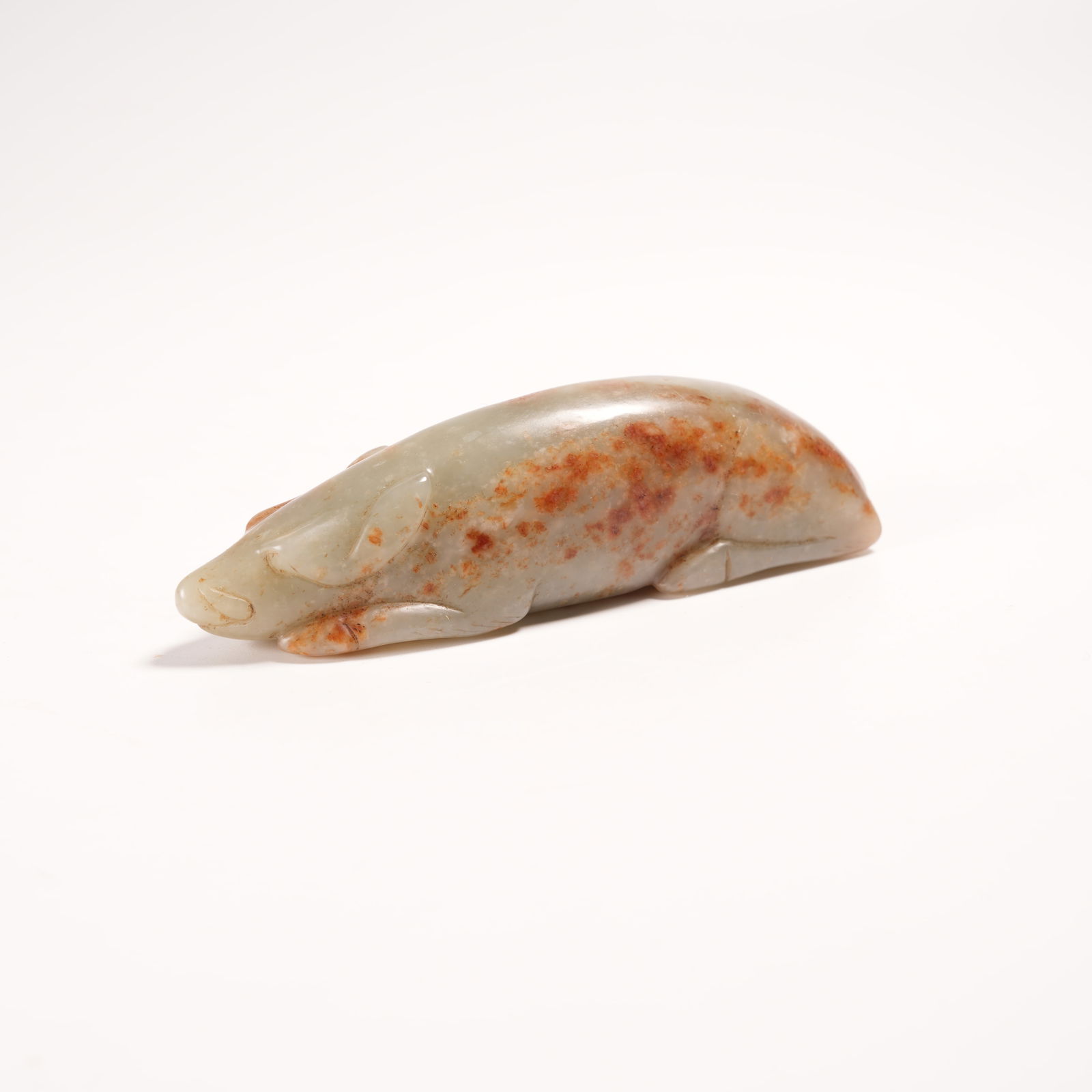 A HANDHELD ORNAMENT IN ARCHAIC JADE: Handheld Ornament in Archaic Jade
