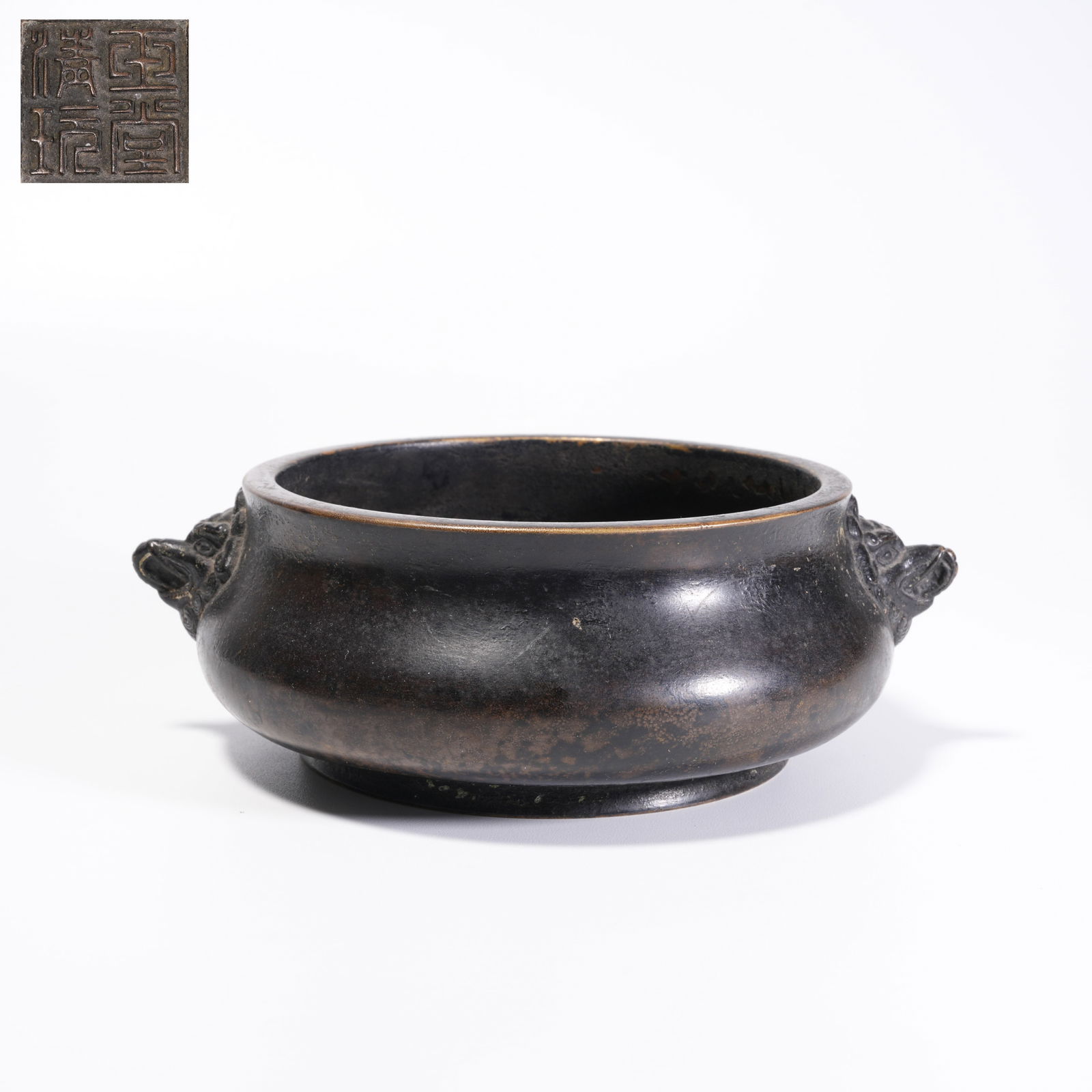 A BRONZE DOUBLE-BEAST-HANDLED CENSER (1 of 9)