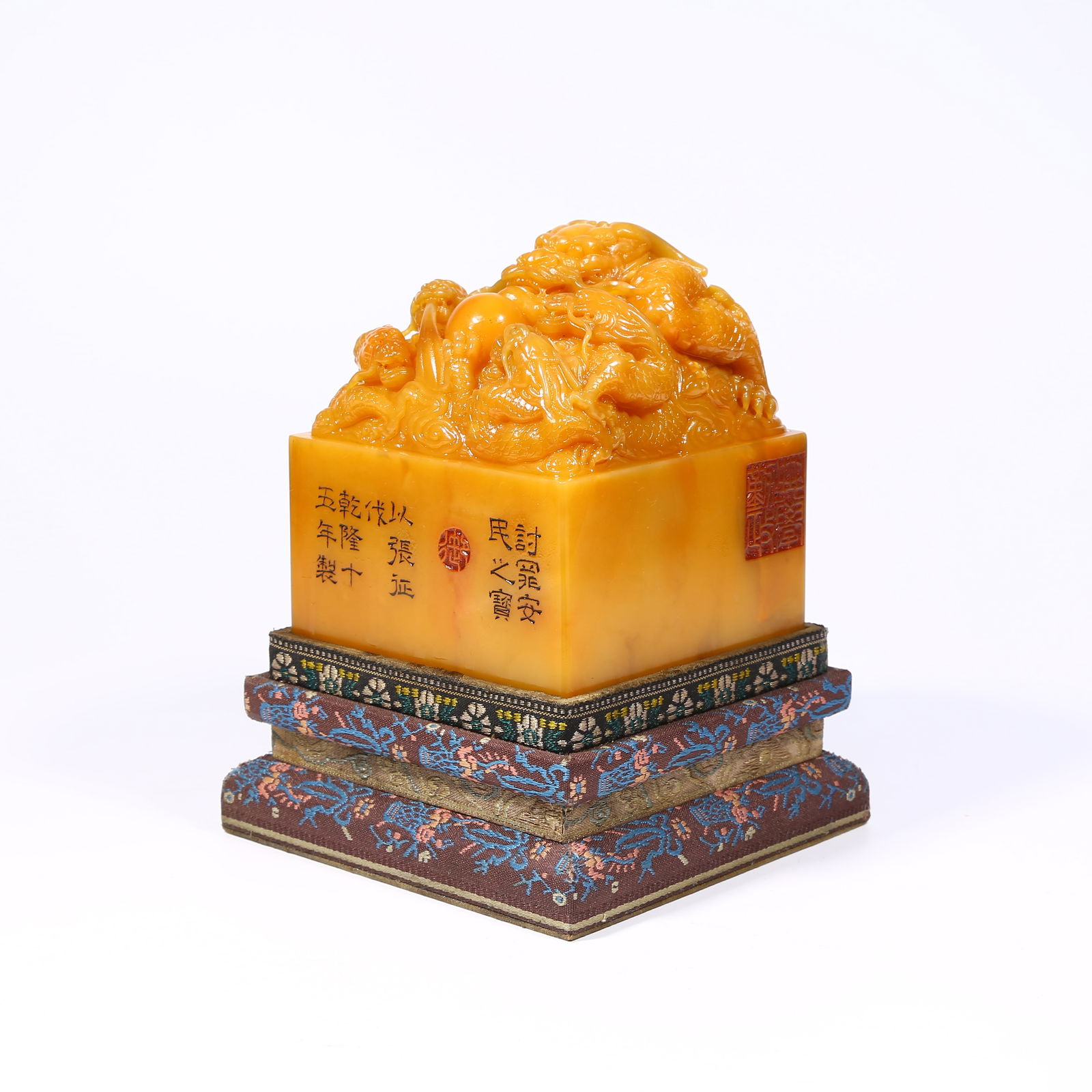 A SHOUSHAN TIANHUANG STONE SEAL WITH DRAGON KNOB: Shoushan Tianhuang stone seal with dragon knob