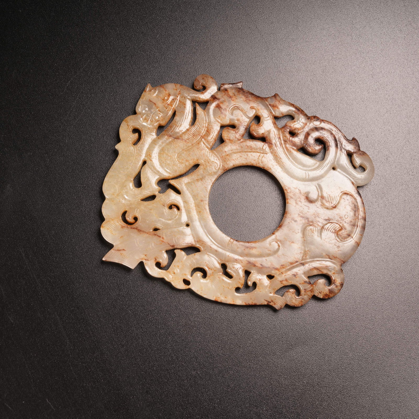 A CHI-DRAGON MOTIF CHICKEN-HEART PENDANT IN ARCHAIC JADE (1 of 9)