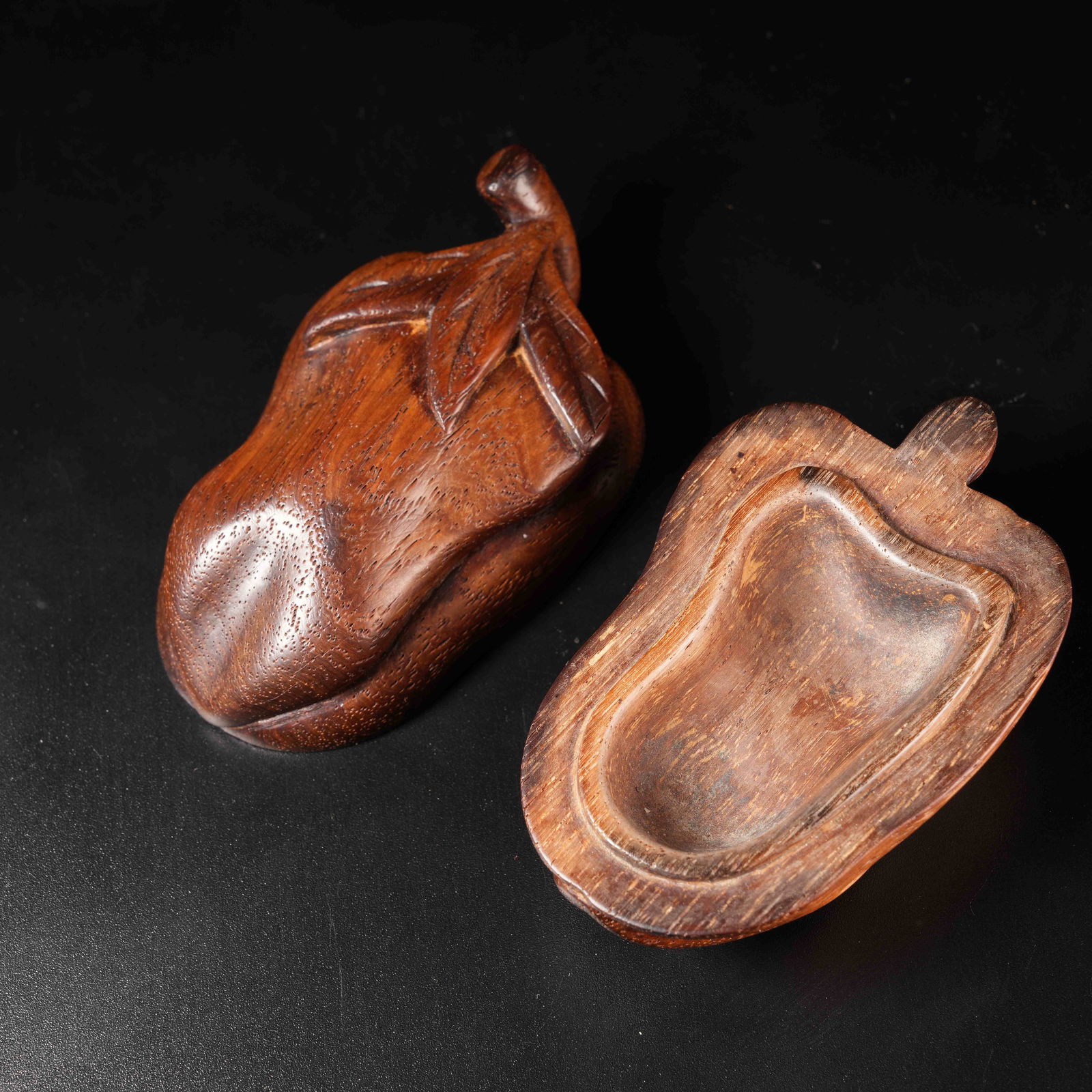 A HUANGHUALI WOOD COVERED BOX IN AUSPICIOUS FRUIT SHAPE: Huanghuali Wood Covered Box in Auspicious Fruit Shape