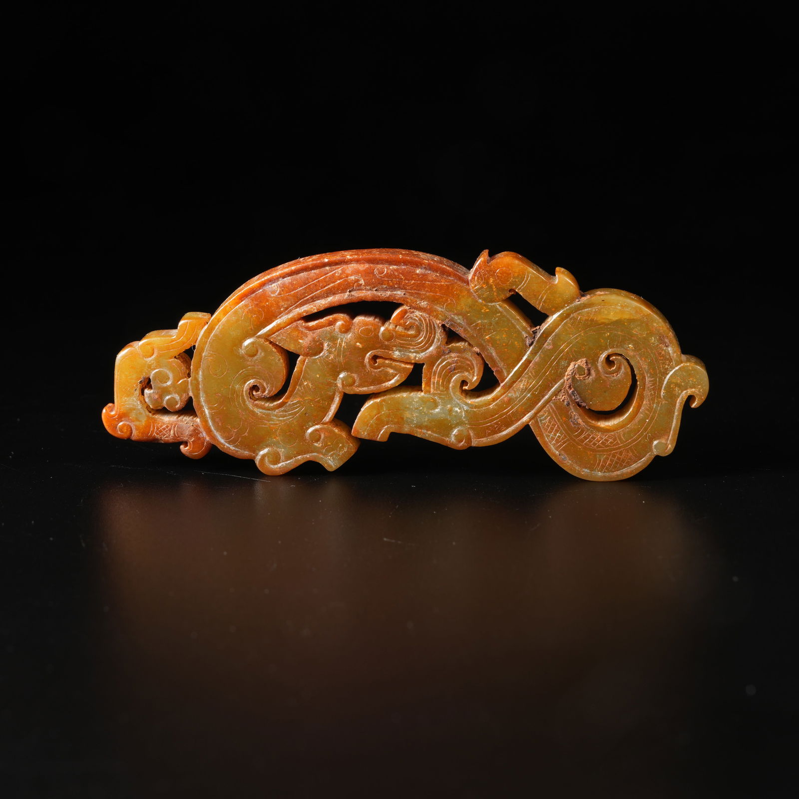 A EIGHT-CHARACTER DRAGON PENDANT IN ARCHAIC JADE (1 of 8)