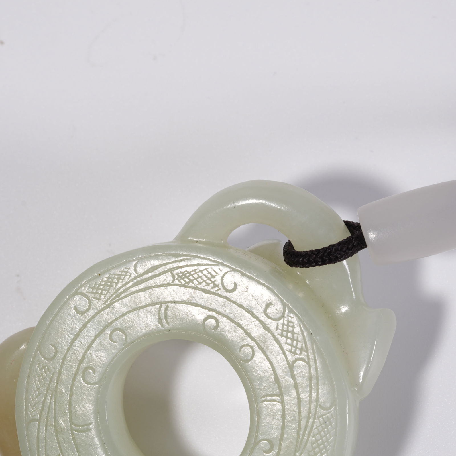 A HETIAN JADE DRAGON PATTERN DISC - 10