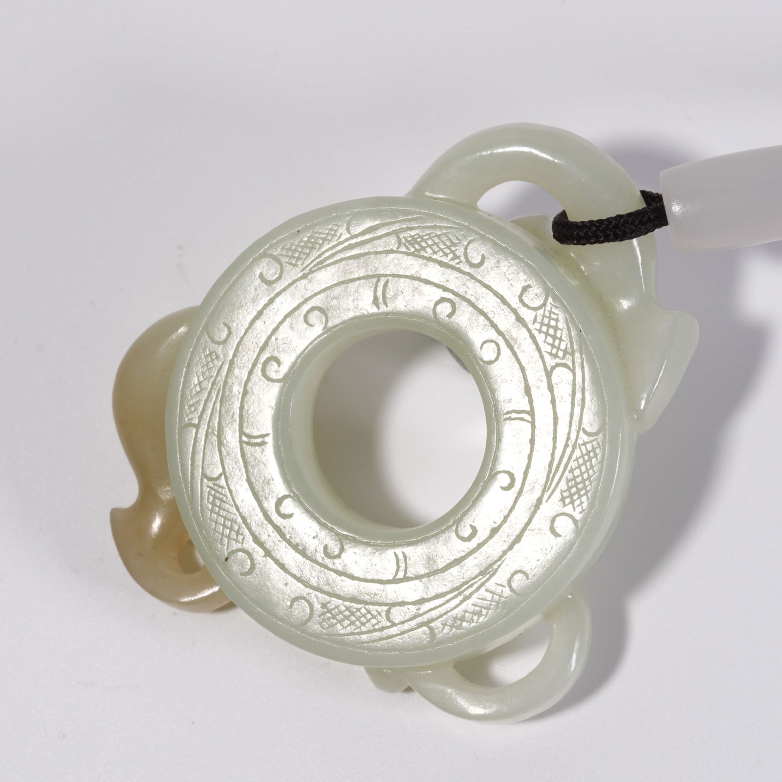 A HETIAN JADE DRAGON PATTERN DISC - 11