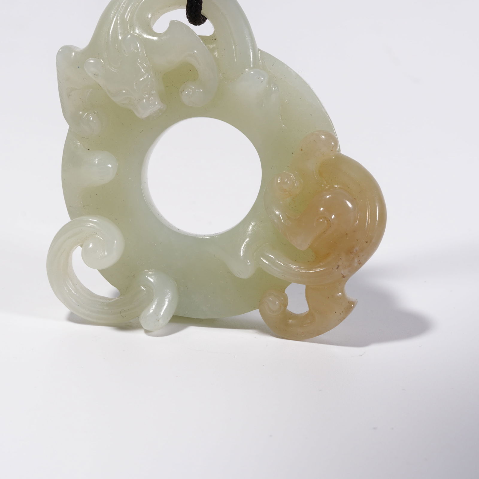 A HETIAN JADE DRAGON PATTERN DISC - 3