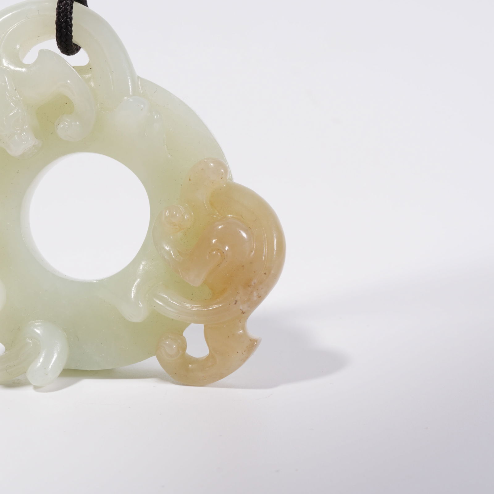 A HETIAN JADE DRAGON PATTERN DISC - 4