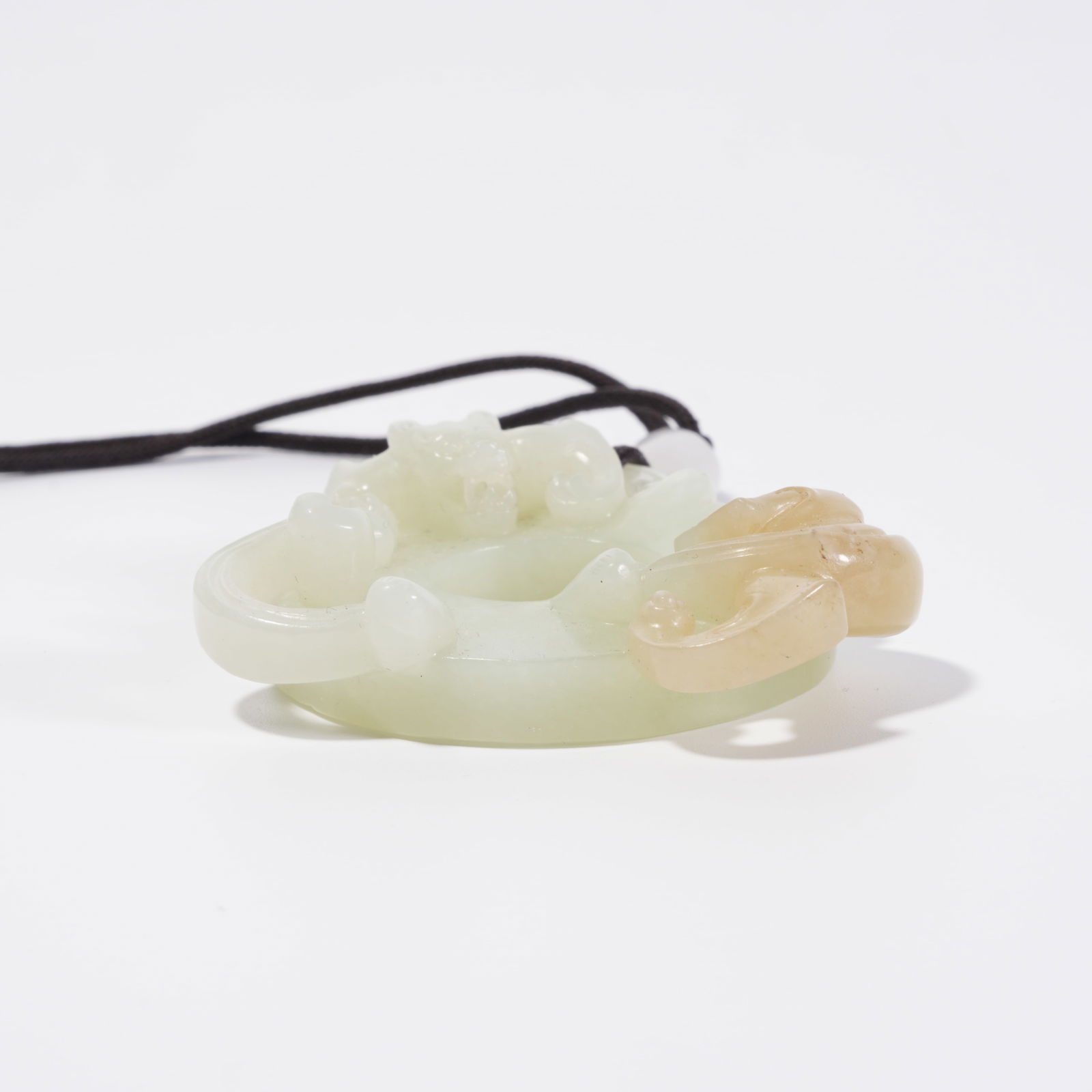 A HETIAN JADE DRAGON PATTERN DISC - 5