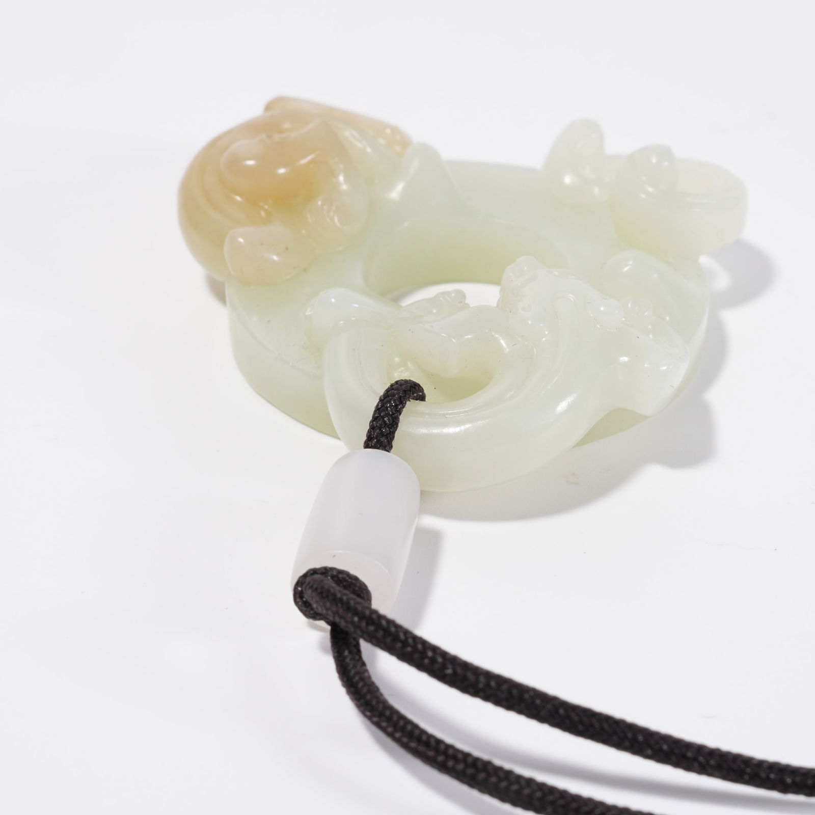 A HETIAN JADE DRAGON PATTERN DISC - 7