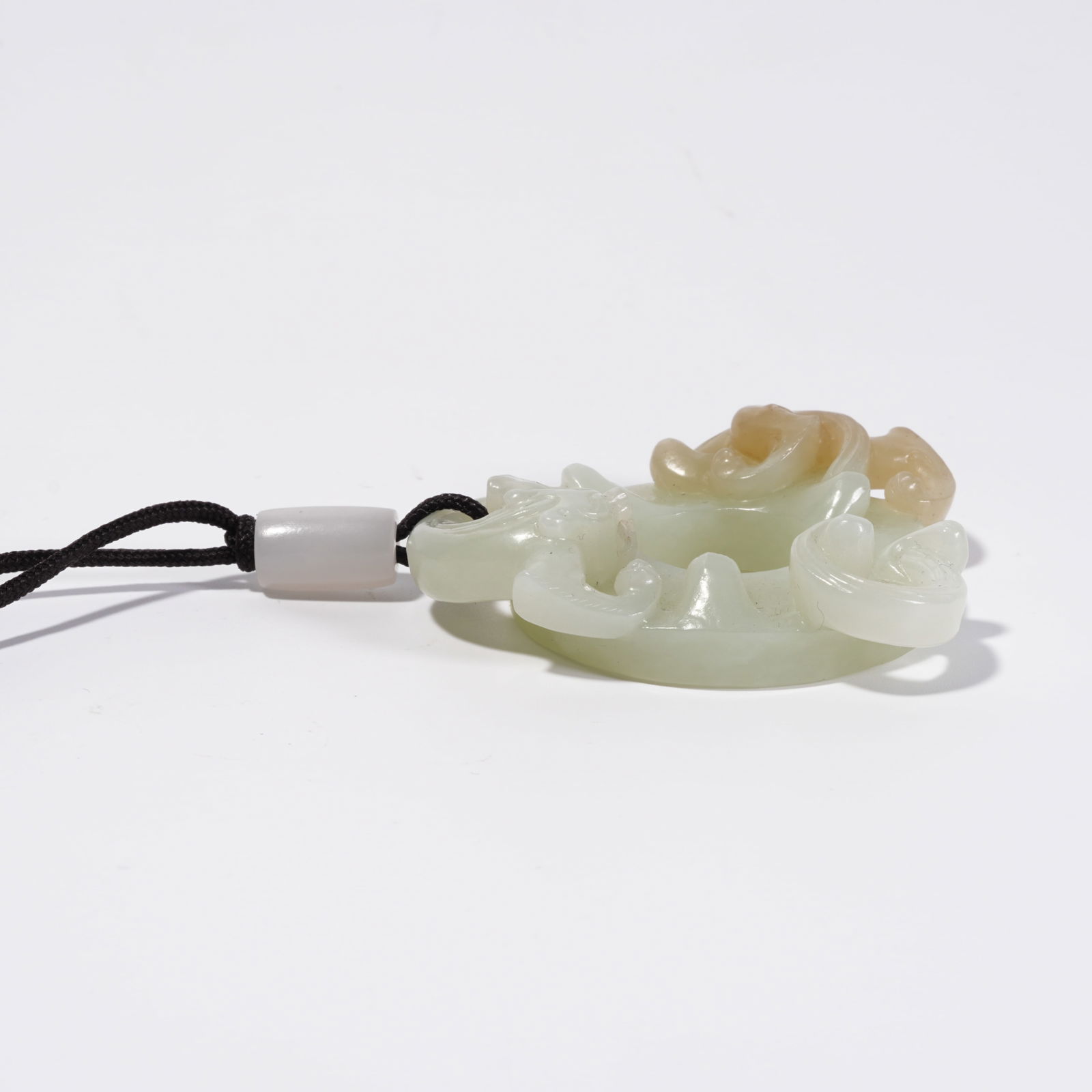 A HETIAN JADE DRAGON PATTERN DISC - 8