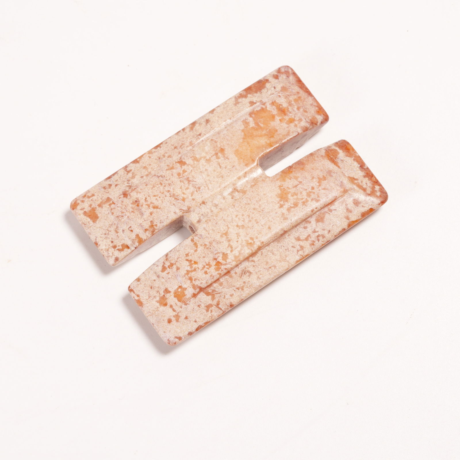 A GONG-SHAPED PENDANT IN ARCHAIC JADE: Gong-Shaped Pendant in Archaic Jade