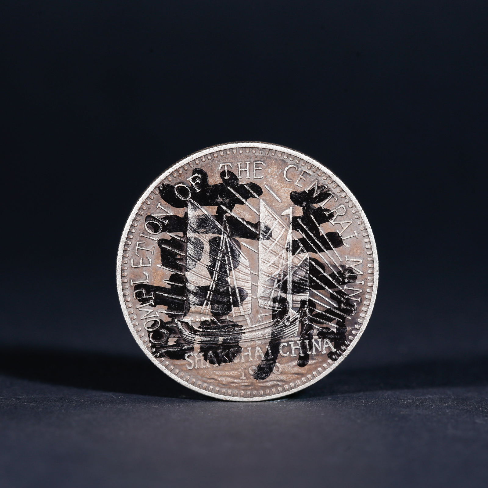 A SILVER DOLLAR COIN - 2