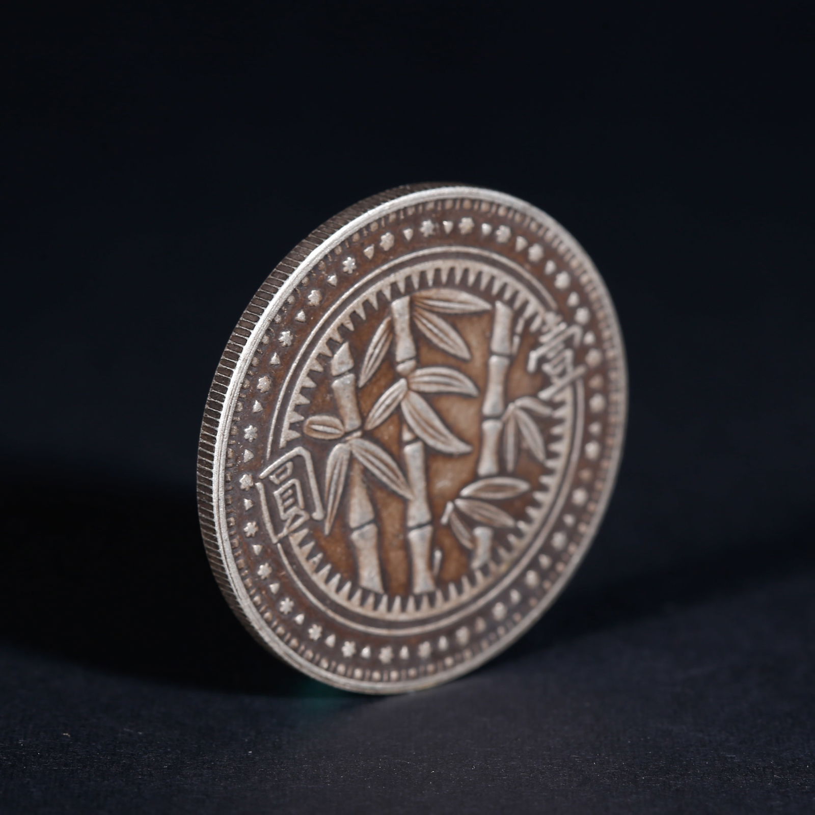 A SILVER DOLLAR COIN - 3