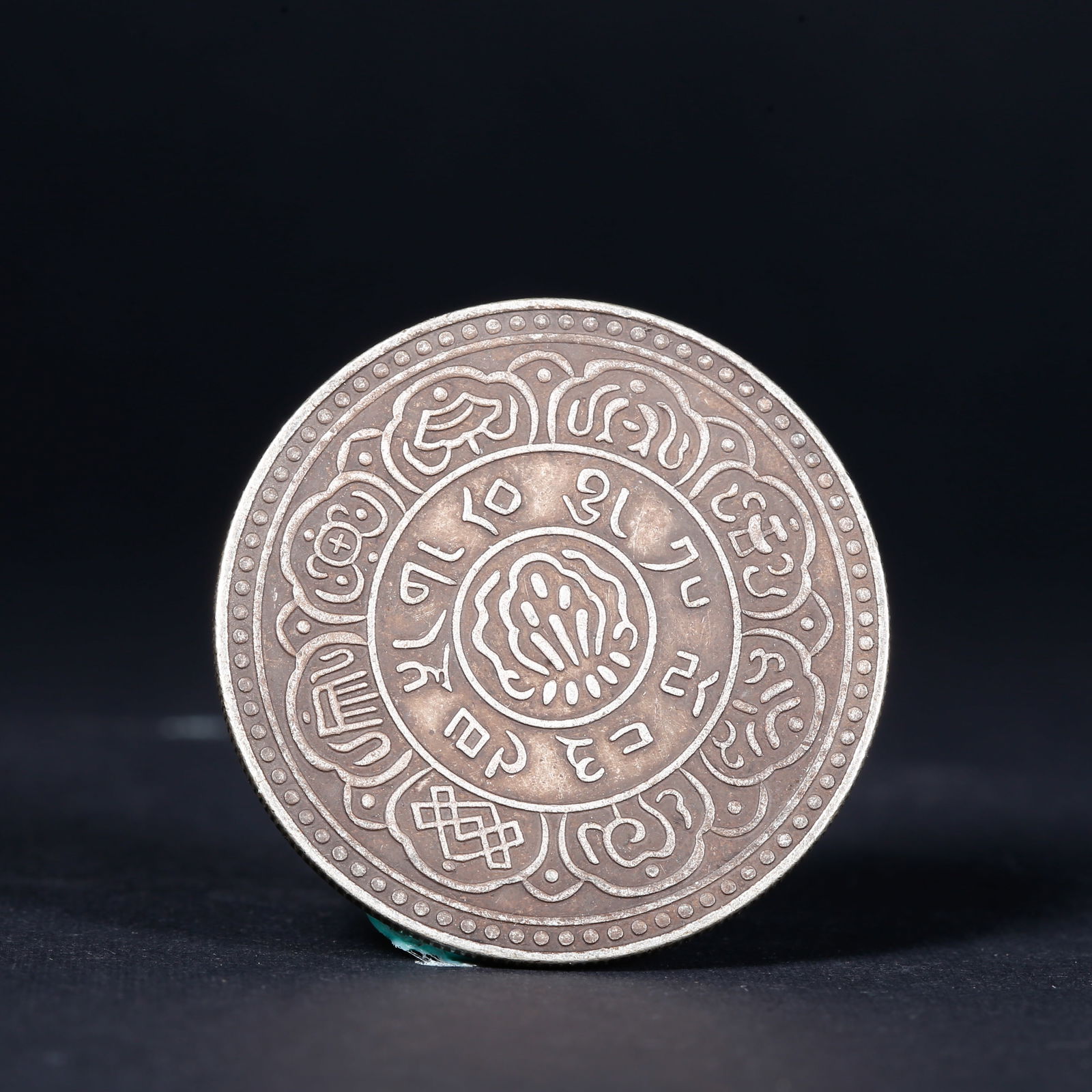 A SILVER DOLLAR COIN - 2