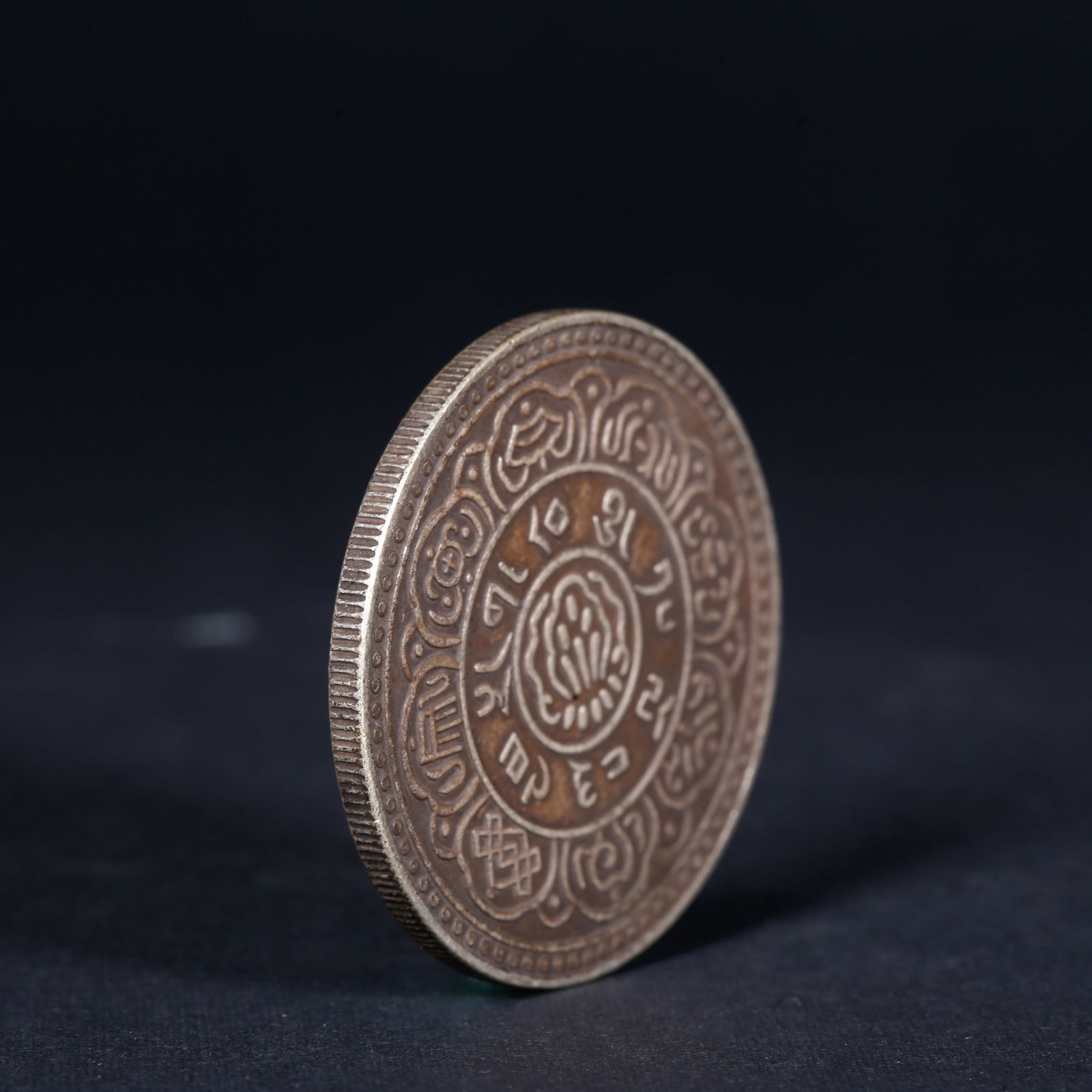 A SILVER DOLLAR COIN - 3