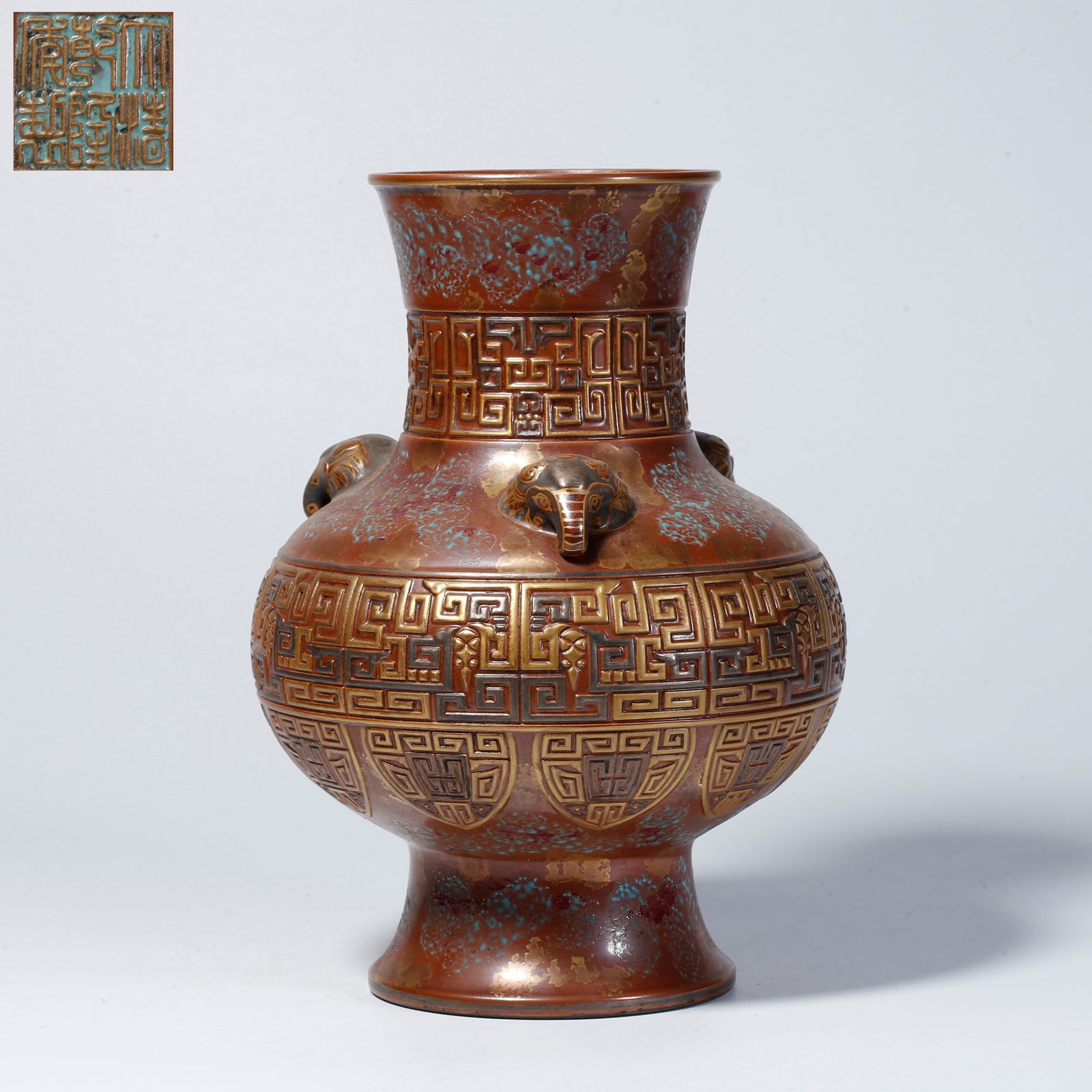 A BRONZE-GLAZED THREE-HANDLED VASE WITH SPLASHED GOLD DECORATION: Bronze-glazed three-handled vase with splashed gold decoration