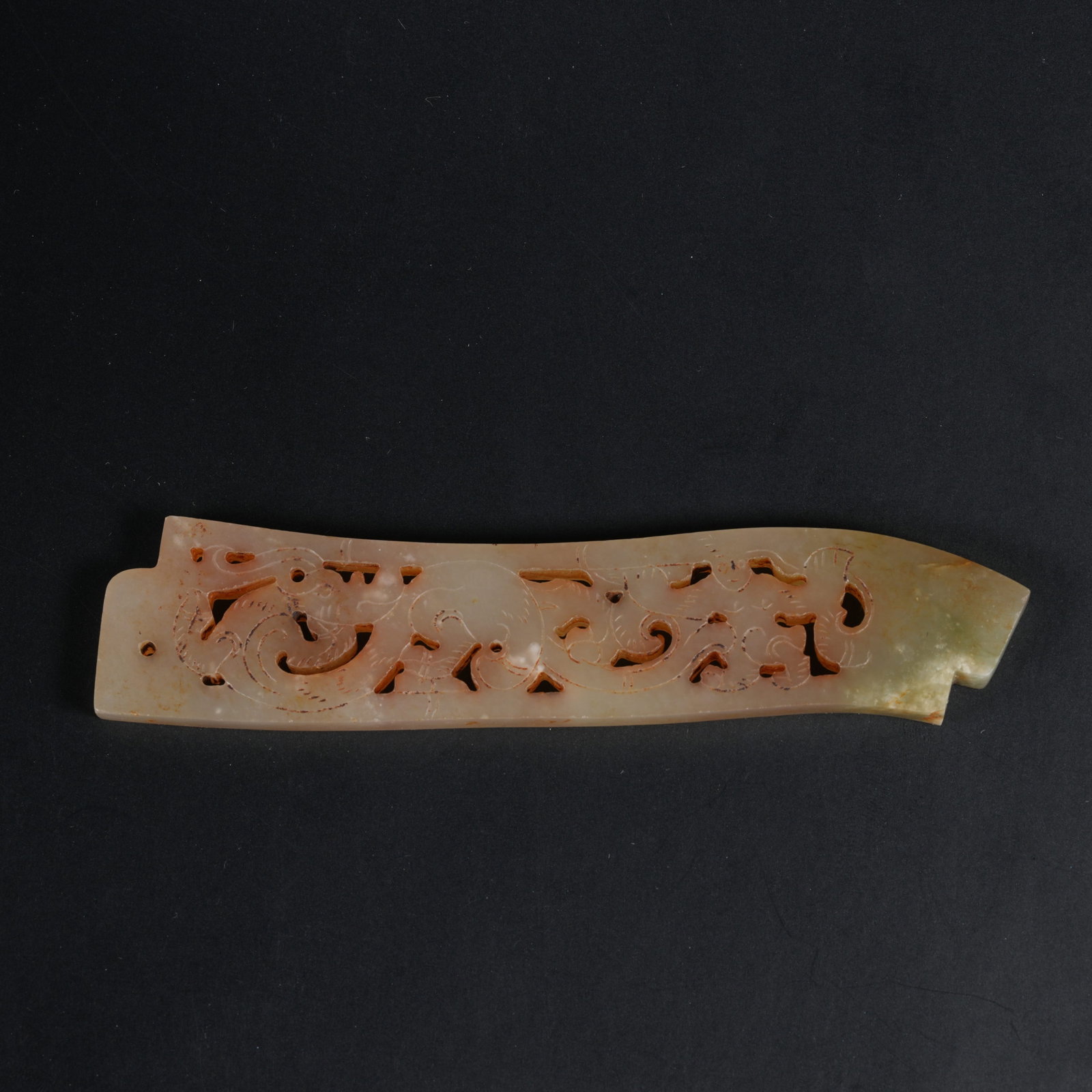 A ARCHAIC JADE PENDANT WITH AUSPICIOUS BEAST MOTIF (1 of 9)