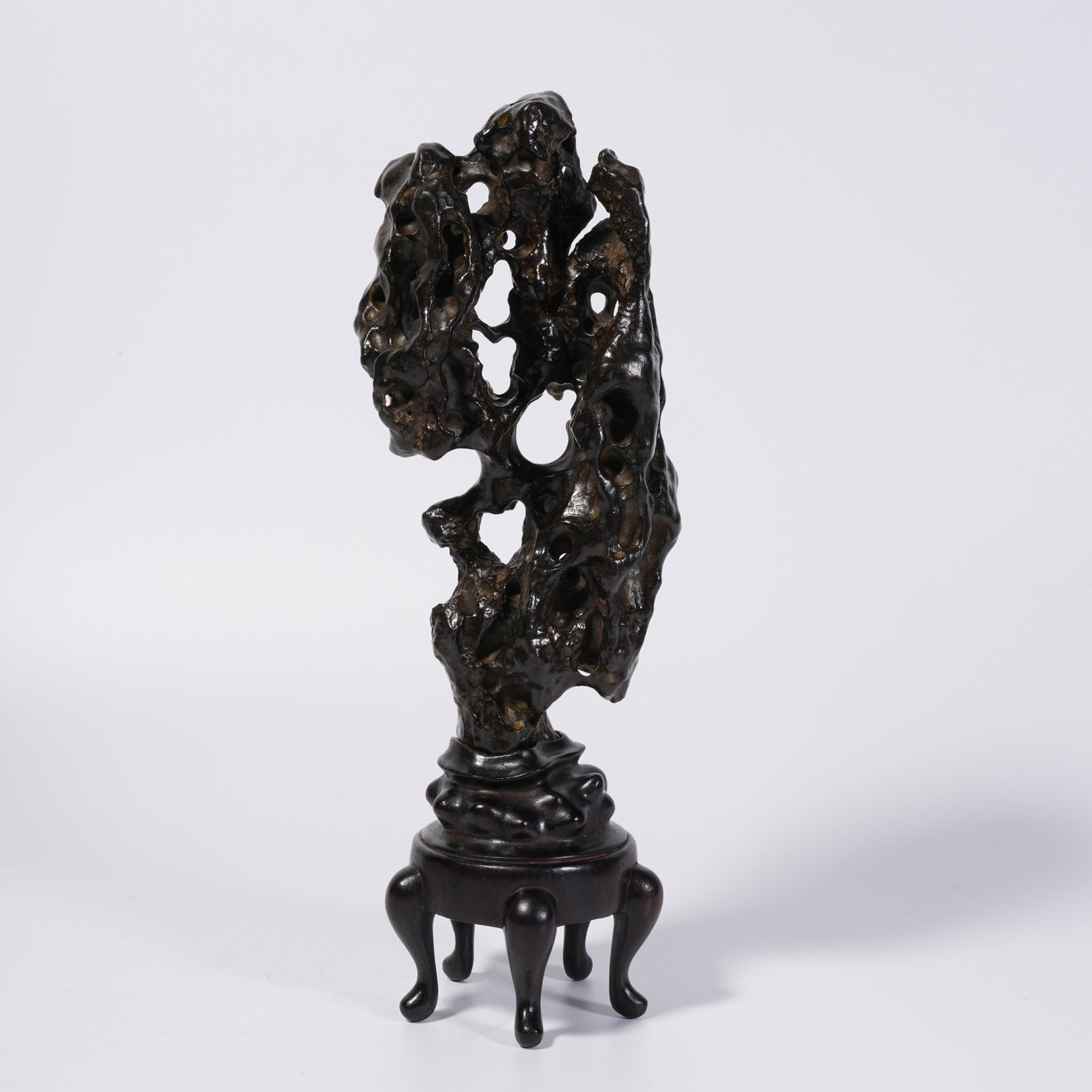 A BRONZE MOUNTAIN-FORM ORNAMENT: Bronze Mountain-Form Ornament