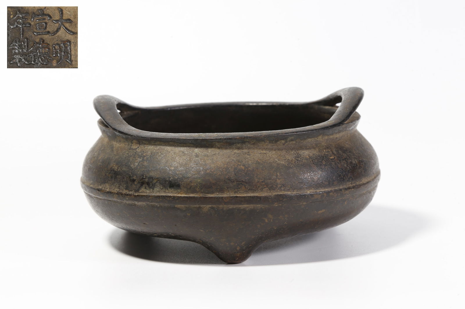 A BRONZE THREE-LEGGED DOUBLE-BRIDGE-HANDLED INCENSE BURNER (1 of 10)