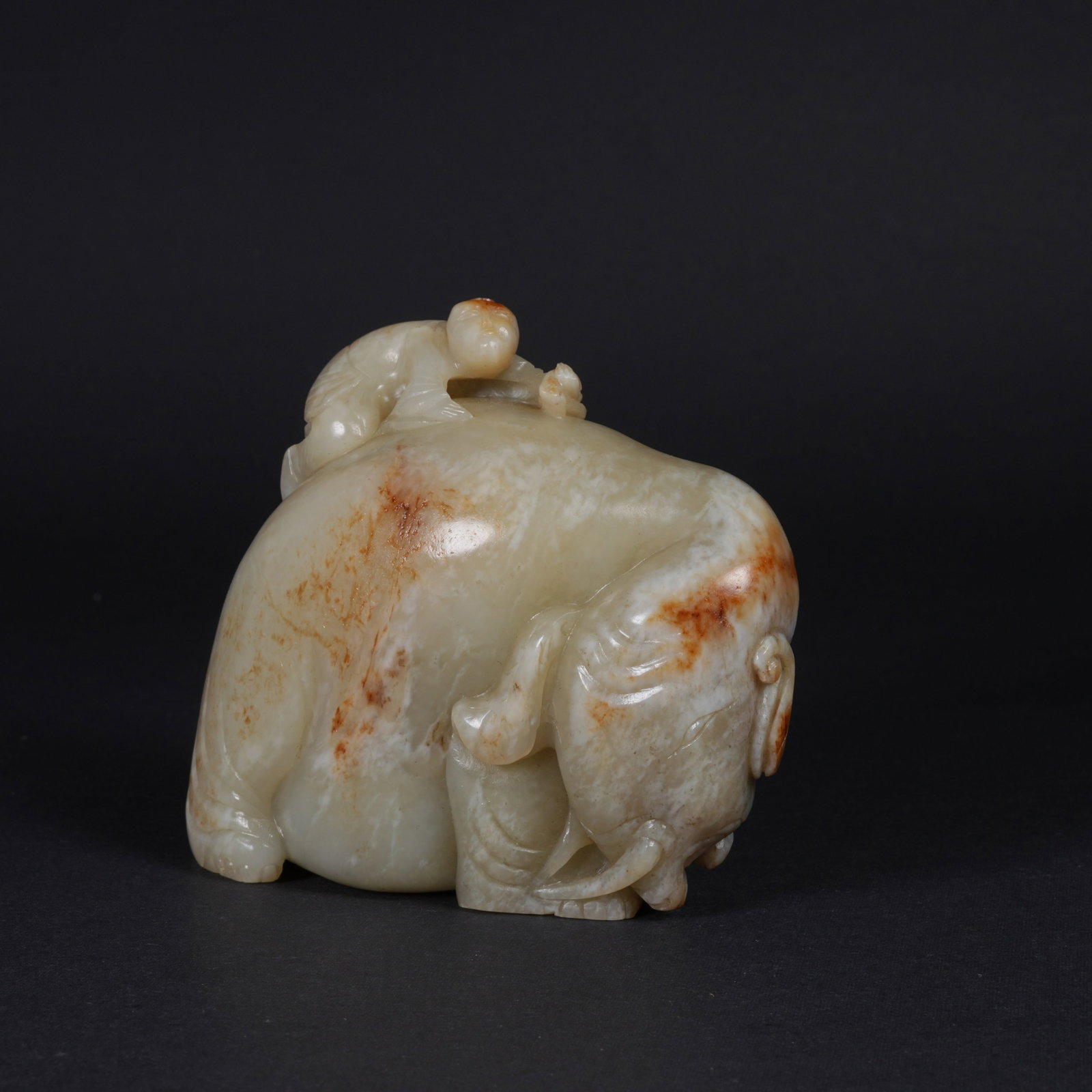 A HETIAN JADE ZOOMORPHIC FIGURINE (1 of 8)