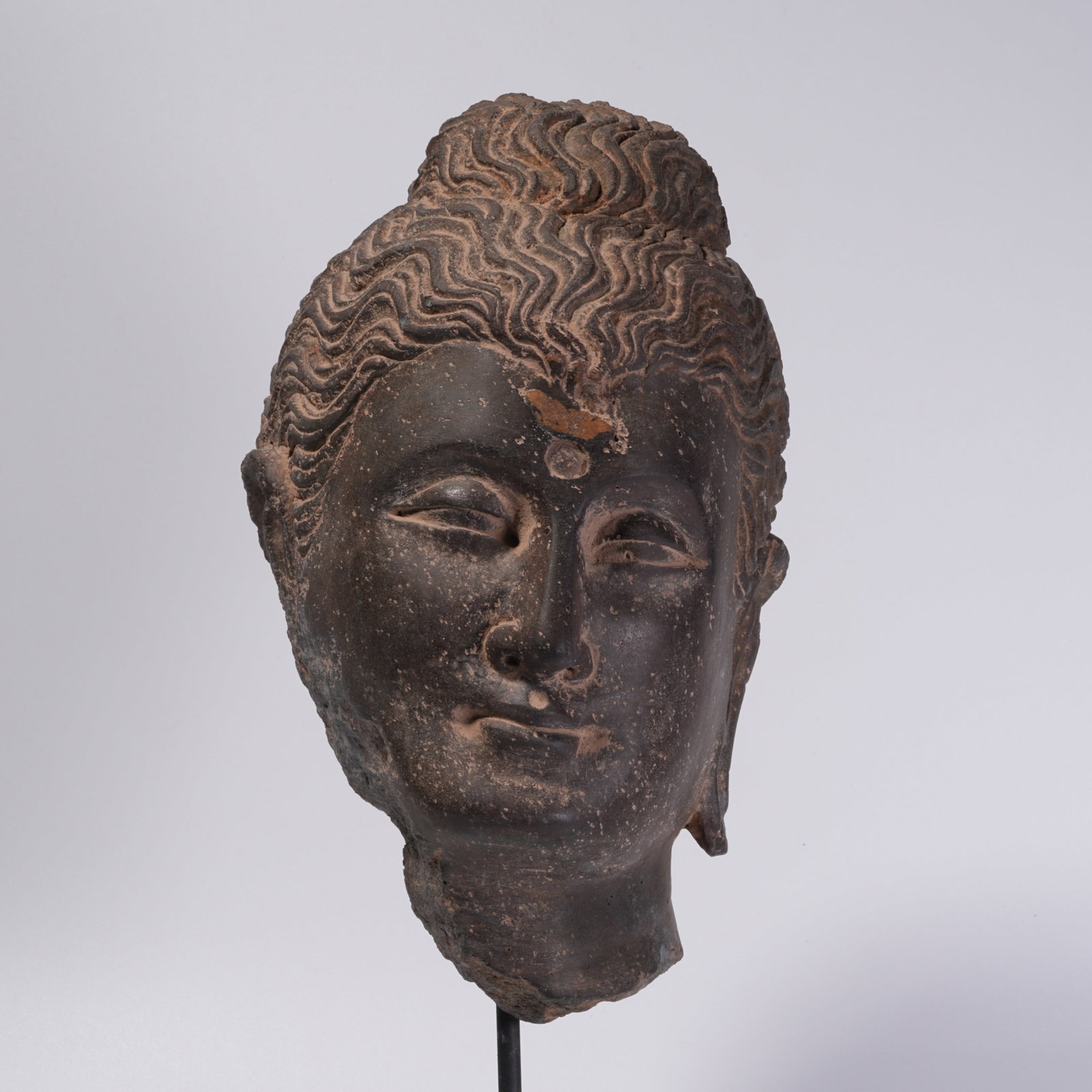 A STONE BUDDHA HEAD - 2