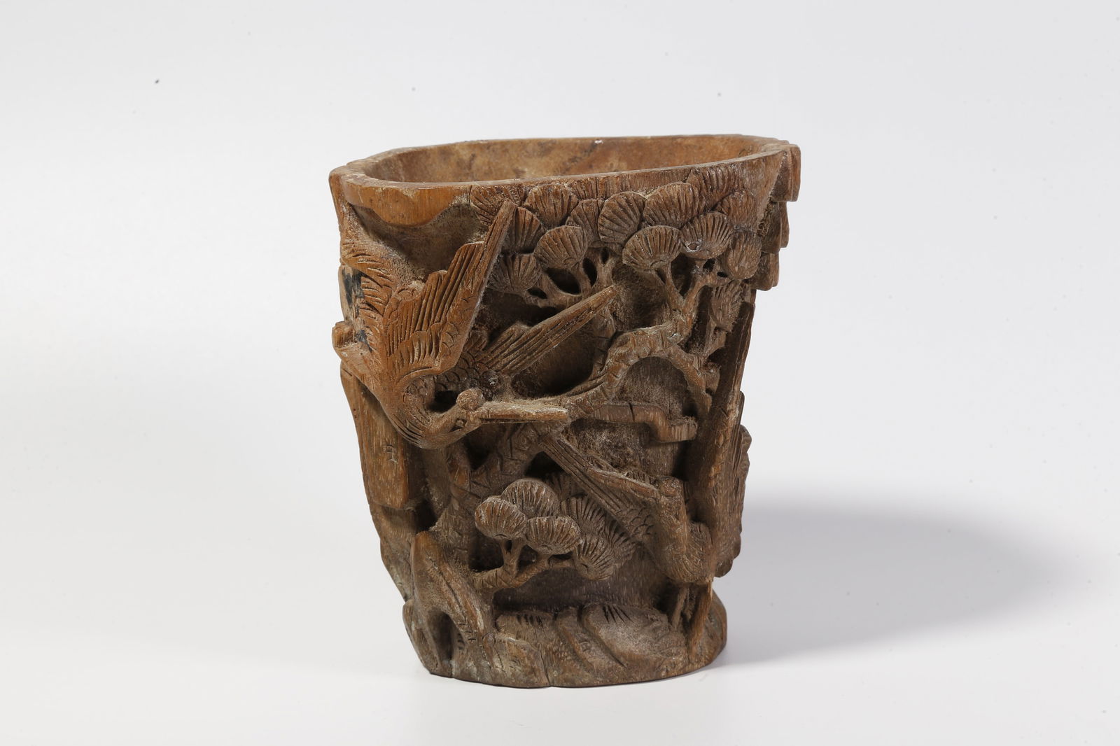 A BAMBOO ROOT CARVED BRUSH POT WITH PINE AND CRANE MOTIF (1 of 9)