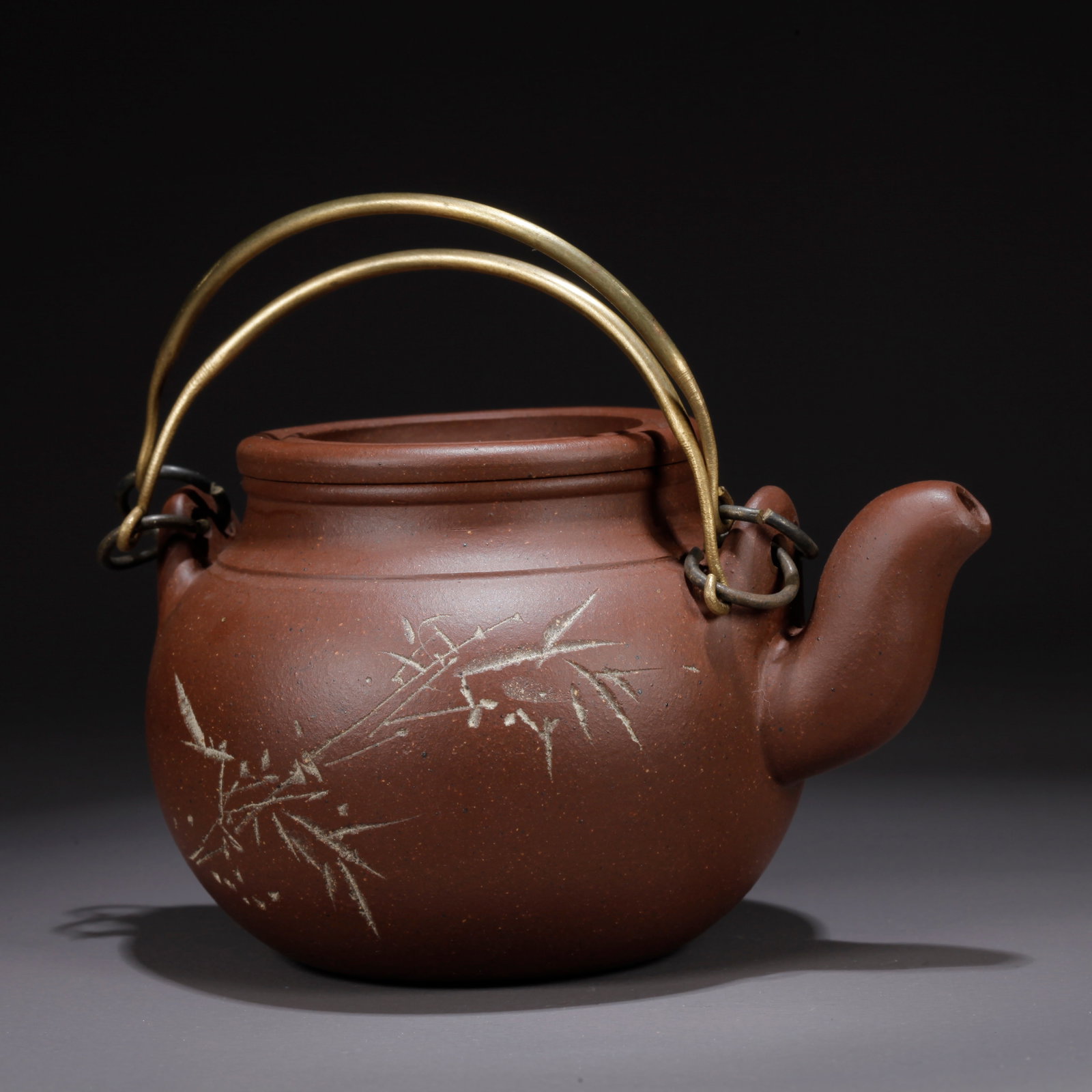 A PURPLE CLAY (ZISHA) TEAPOT WITH INSCRIBED POETRY: Purple Clay (Zisha) Teapot with Inscribed Poetry