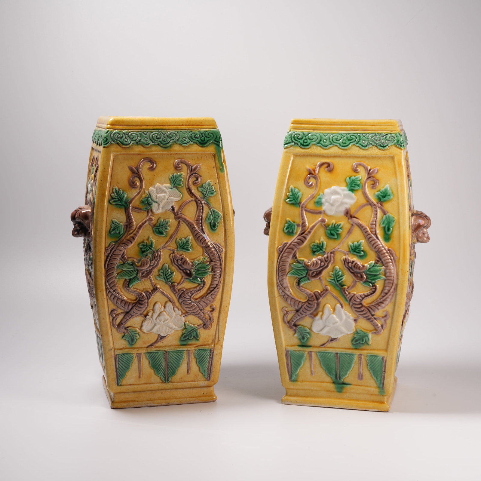 A SET OF PLAIN SANCAI VASES WITH DRAGON MOTIF AND BEAST-HEAD HANDLES: Set of Plain Sancai Vases with Dragon Motif and Beast-Head Handles