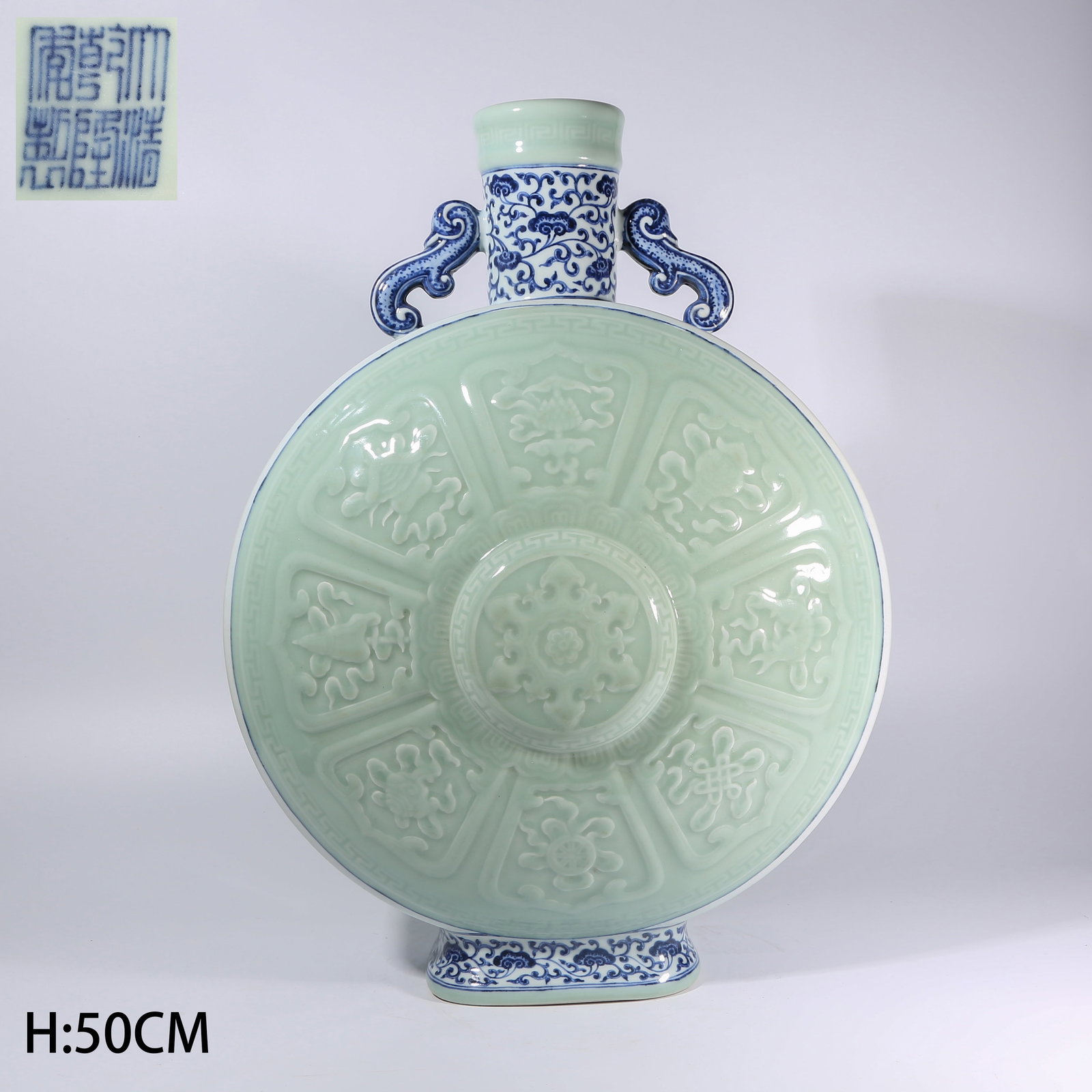 A BLUE-AND-WHITE OPEN-WINDOW WITH POWDER-BLUE GLAZE EIGHT AUSPICIOUS SYMBOLS MOON FLASK (1 of 9)