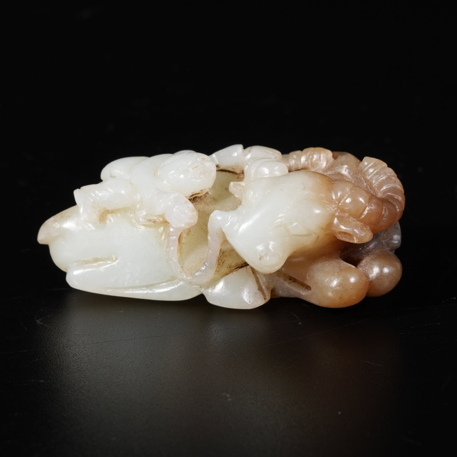 A HETIAN JADE BOY HERDING OX ORNAMENT: Hetian Jade Boy Herding Ox Ornament