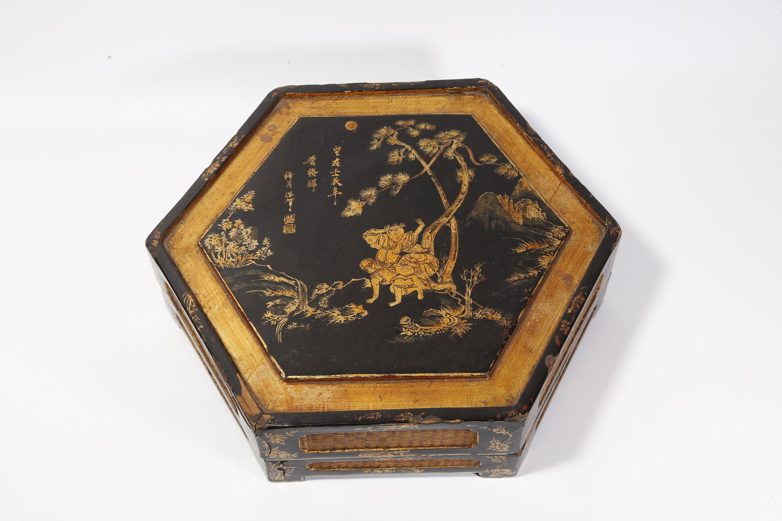 A WOOD WITH LACQUER AND GILDED COVERED BOX WITH FIGURES AND STORIES MOTIF: Wood with Lacquer and Gilded Covered Box with Figures and Stories Motif